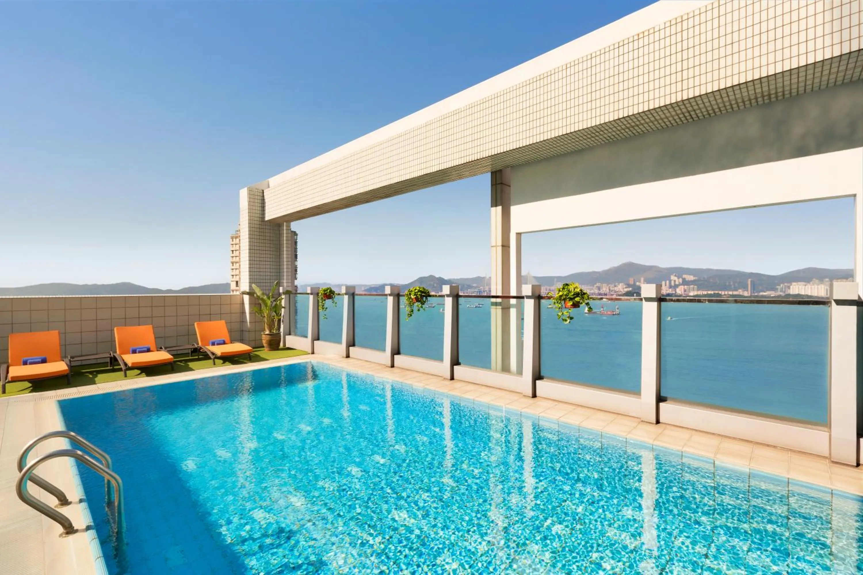 Swimming pool in Jen Hong Kong by Shangri-La