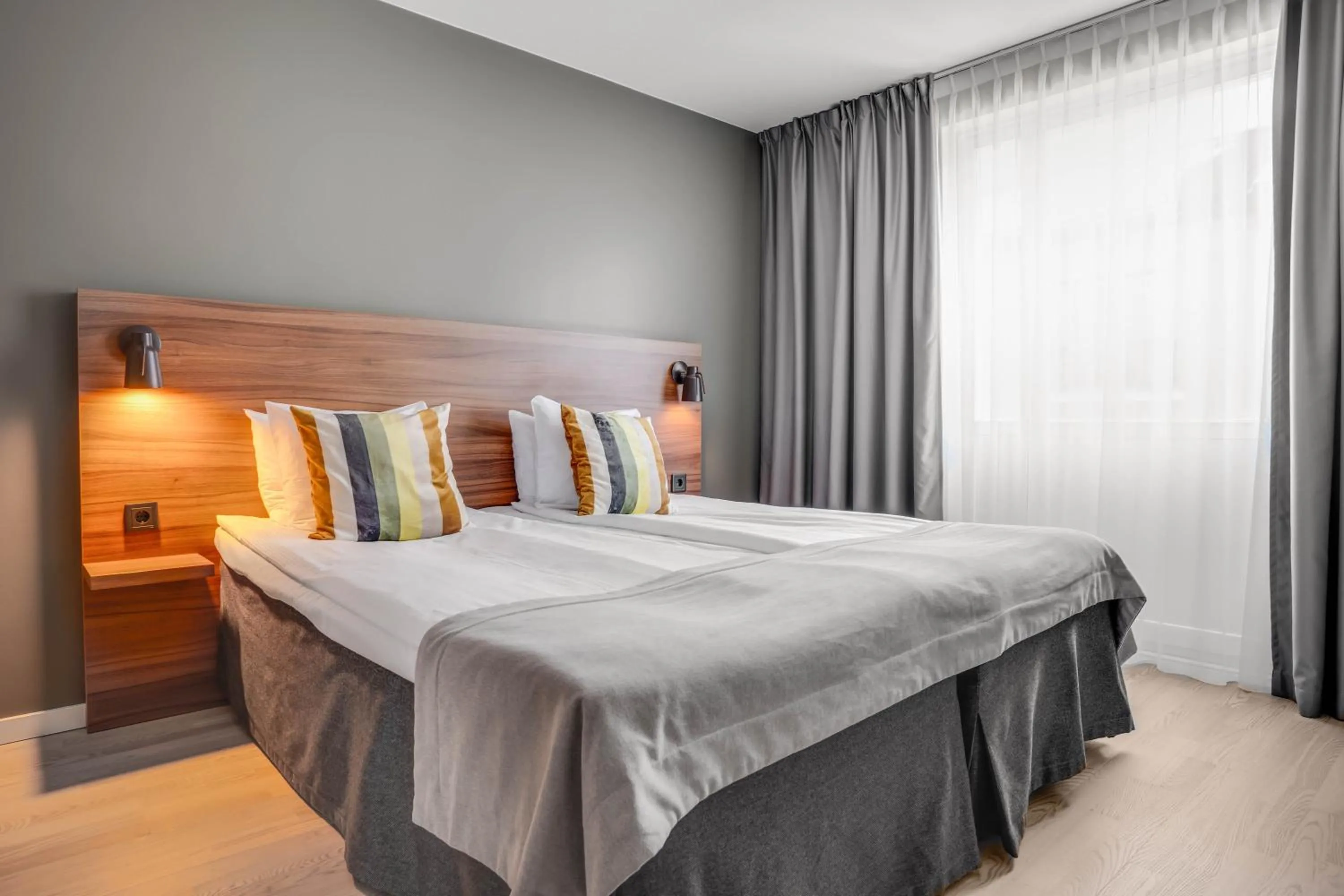 Bed in ProfilHotels Grand Kristianstad