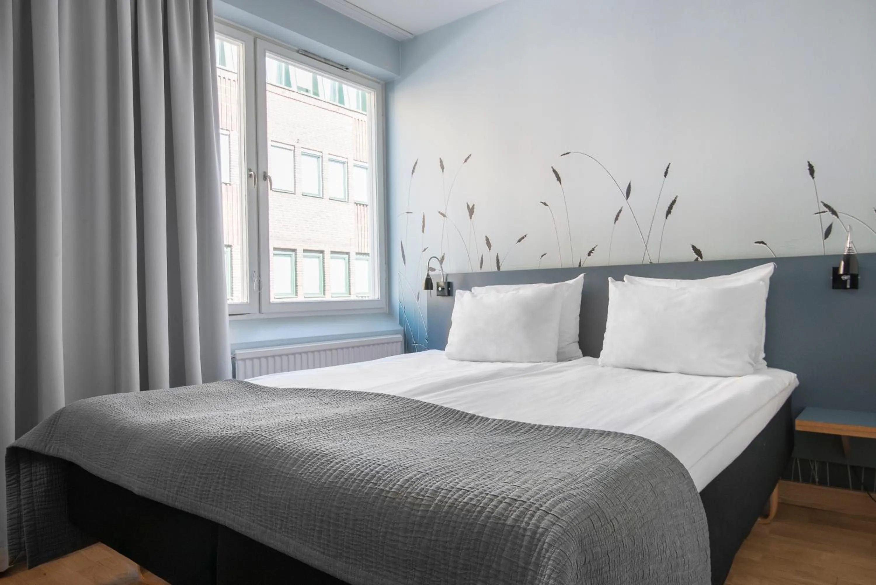 Bedroom, Bed in ProfilHotels Grand Kristianstad