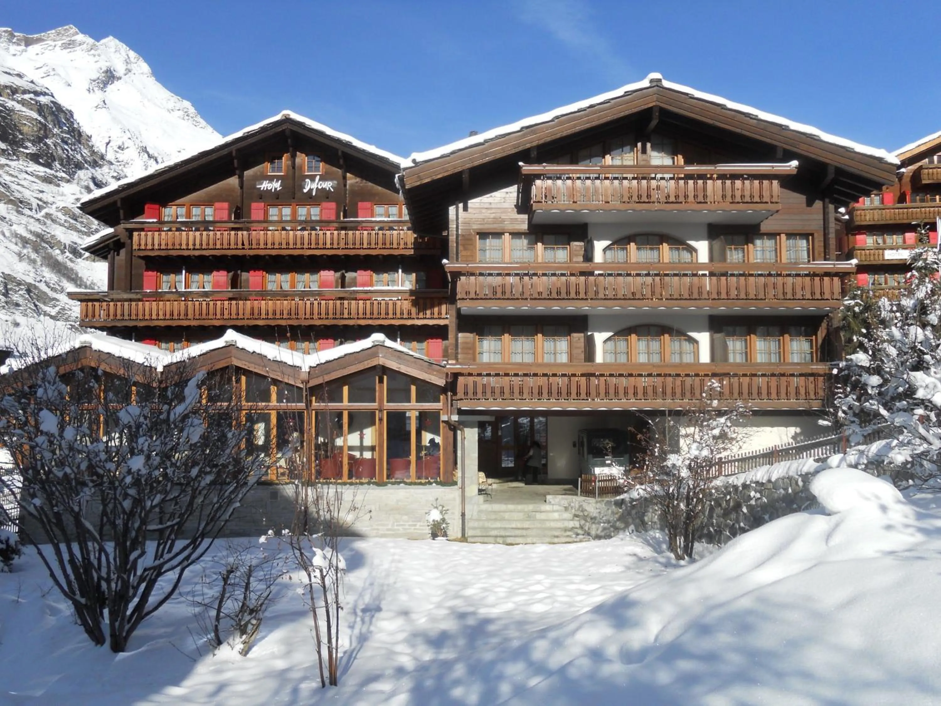 Facade/entrance, Winter in Hotel Dufour Alpin Superior - Adults only