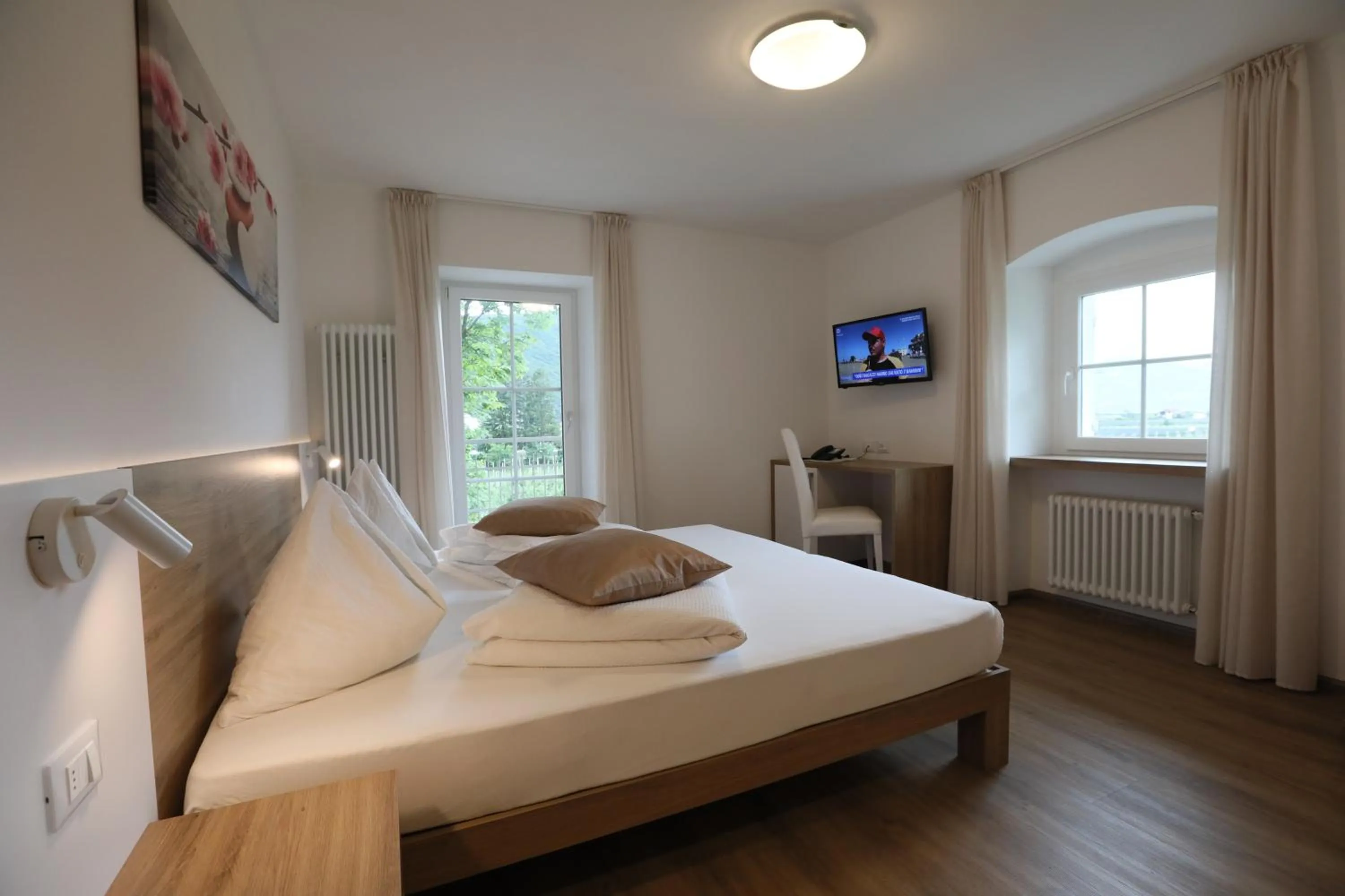 Bed in Hotel Stampfer B&B