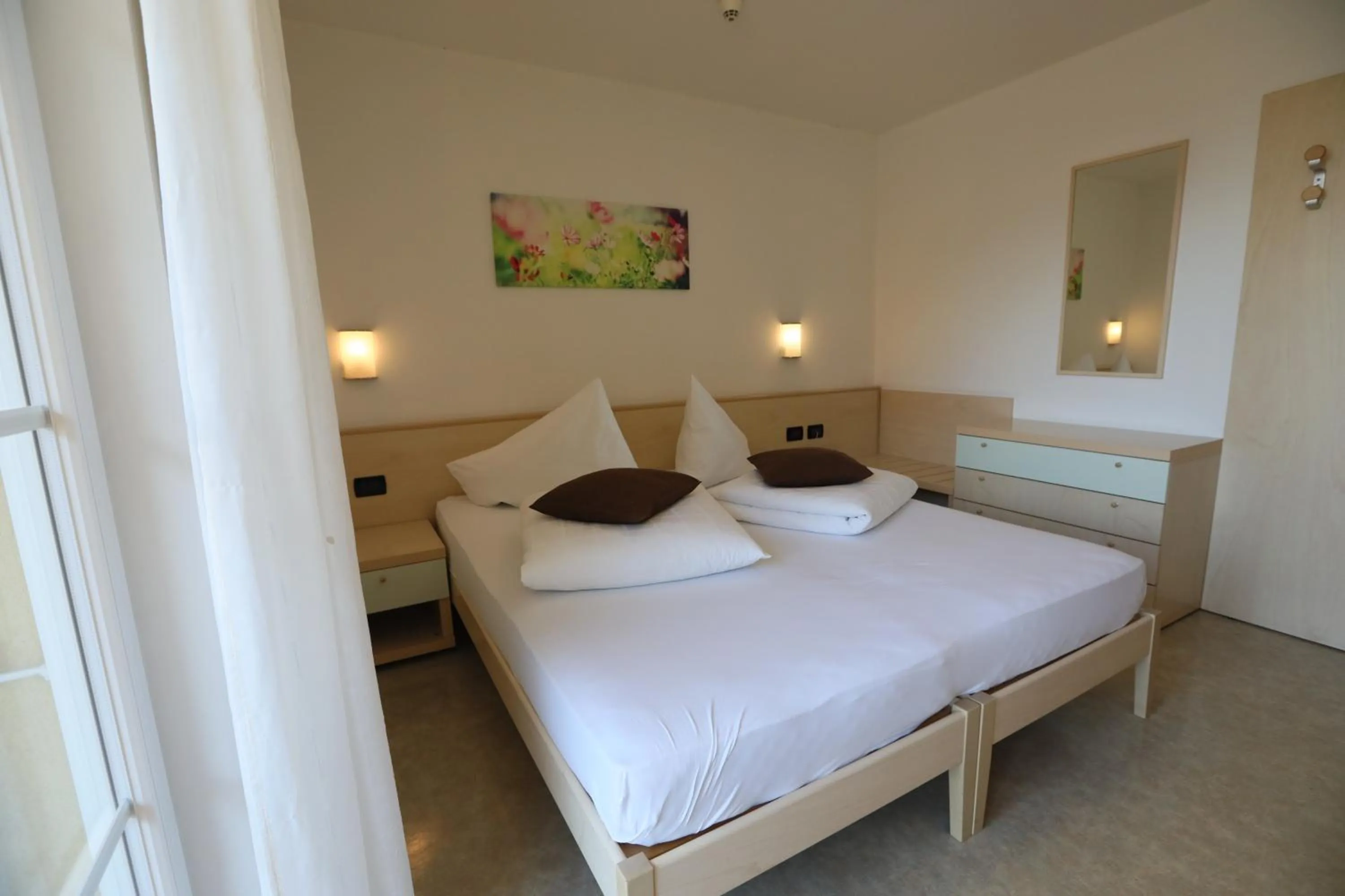 Bed in Hotel Stampfer B&B