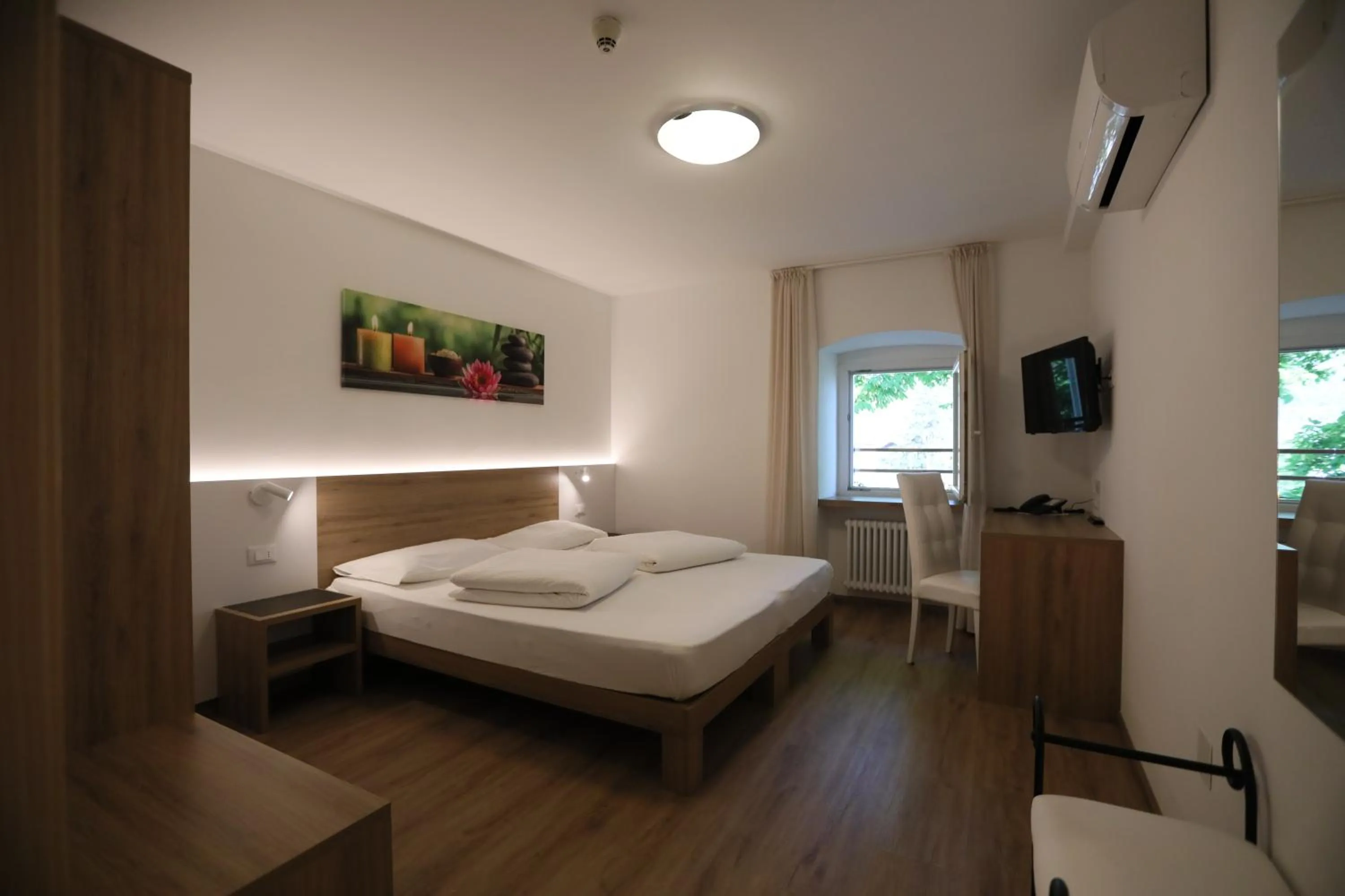 Bed in Hotel Stampfer B&B