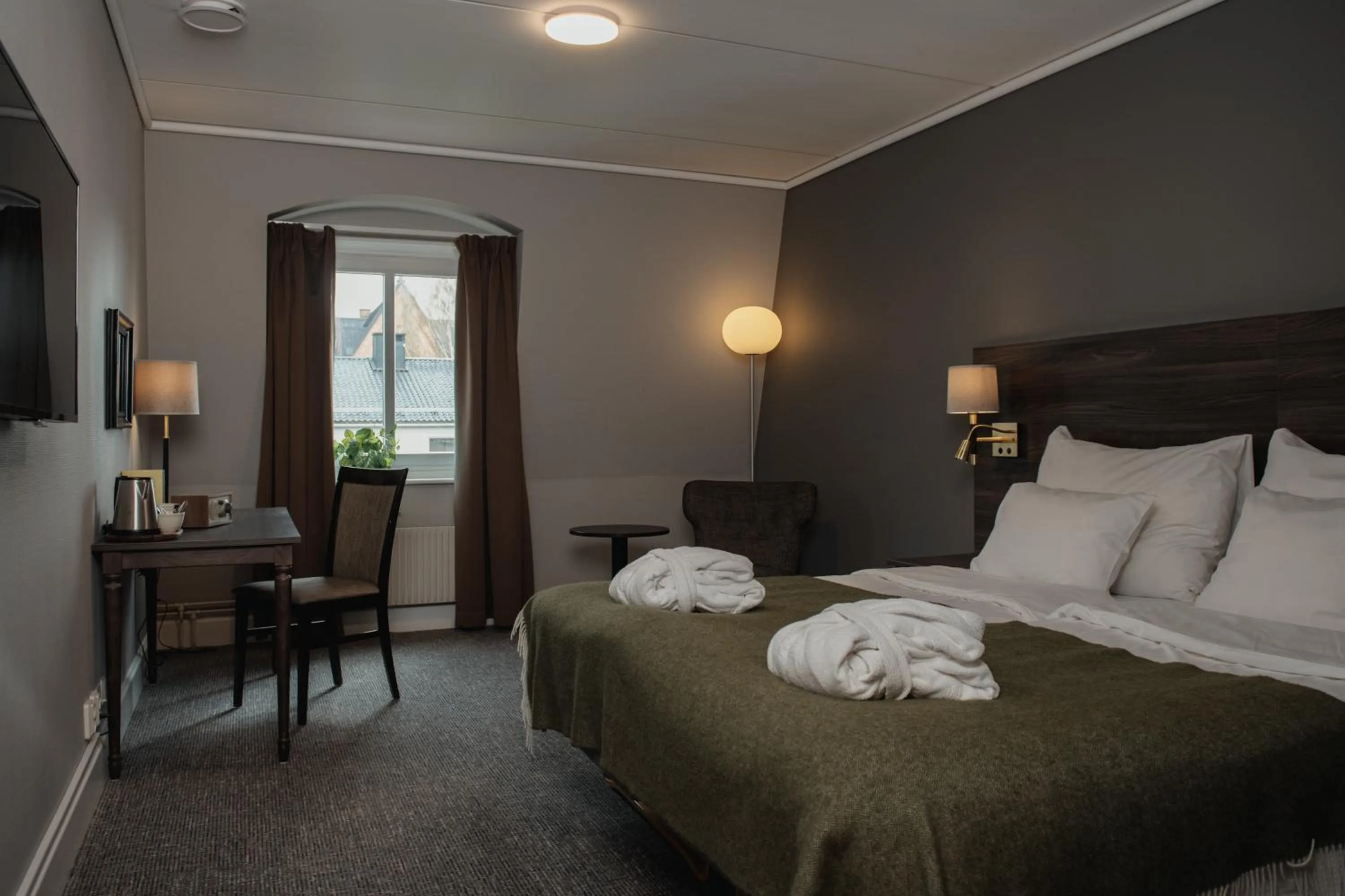 Bed in Home Hotel Uman