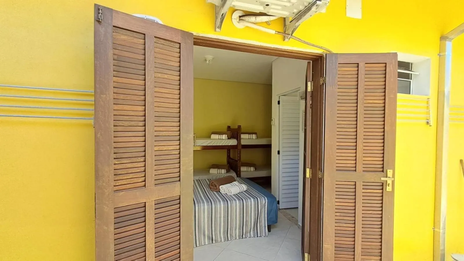 Photo of the whole room in Suítes Cantinho do Sossego Ubatuba