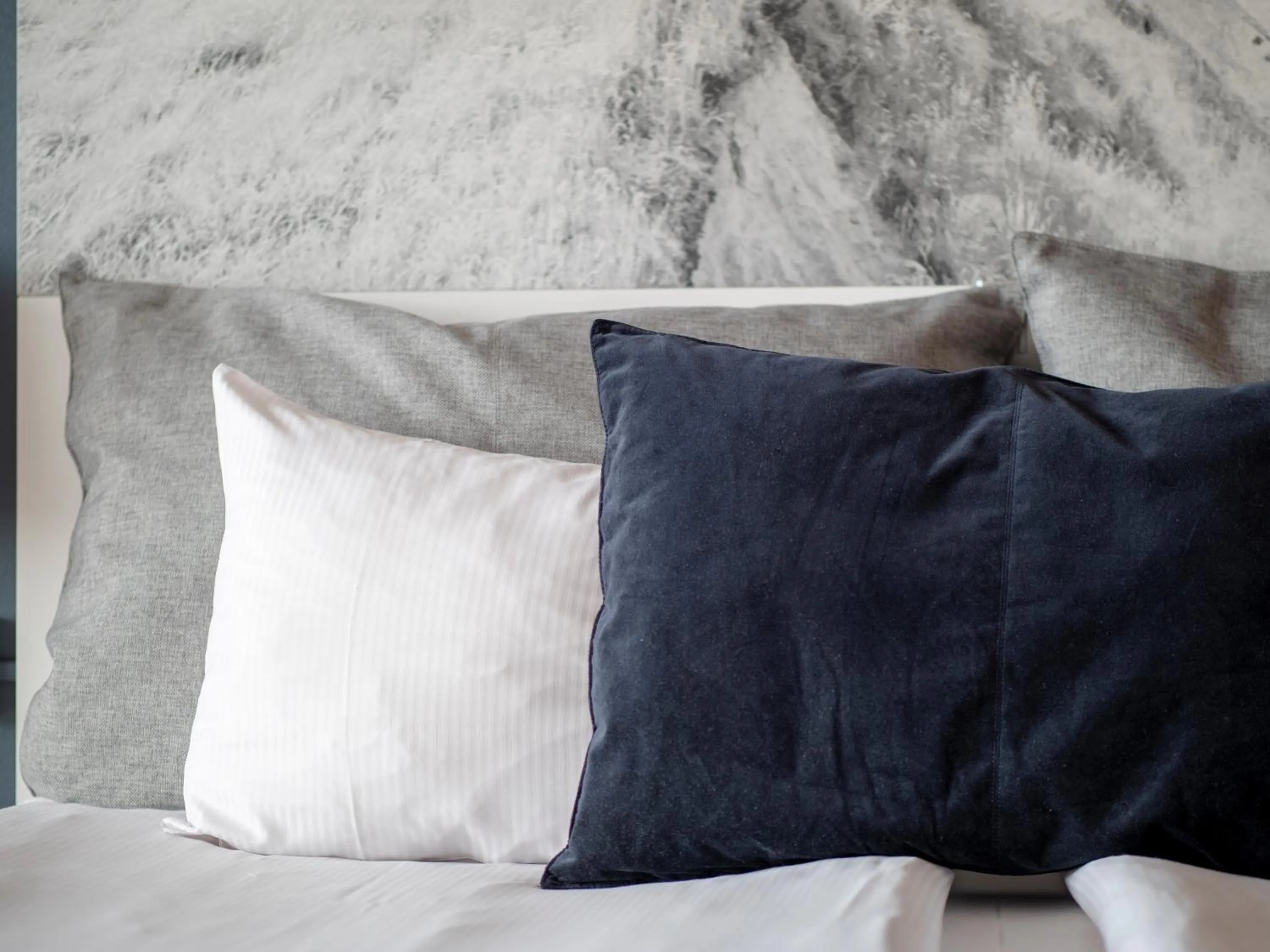 Bed in Clarion Hotel Sign