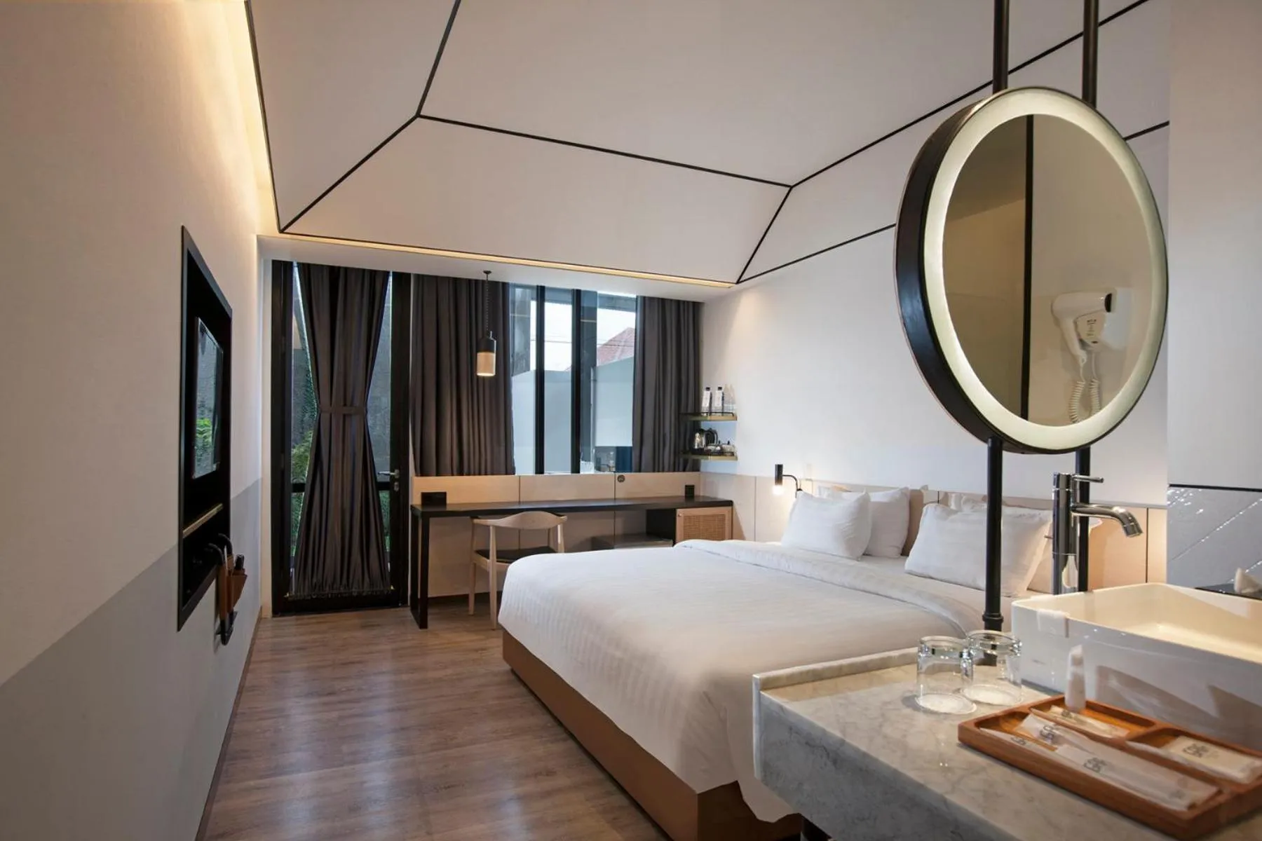 Bed in GAIA Cosmo Hotel