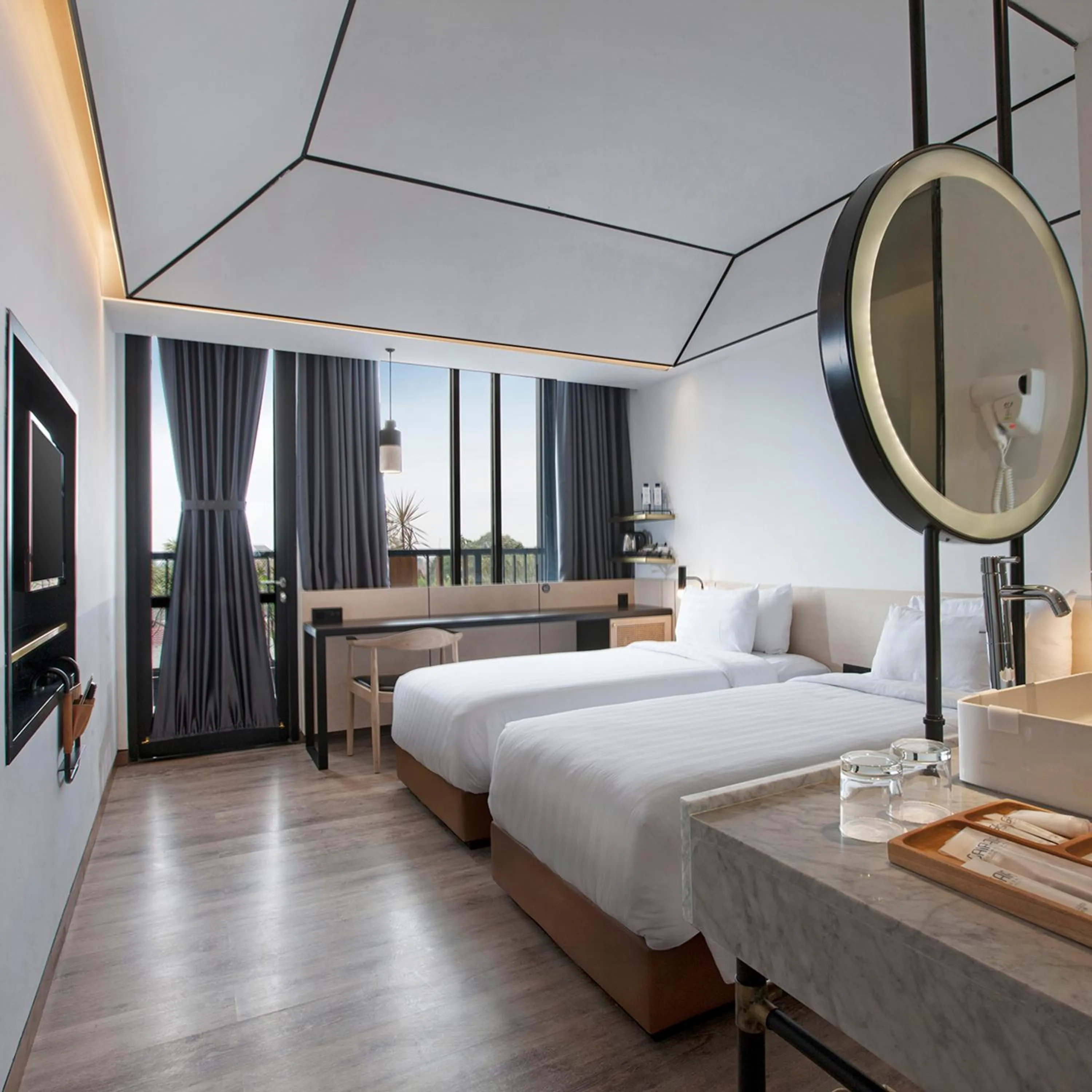 Bed in GAIA Cosmo Hotel