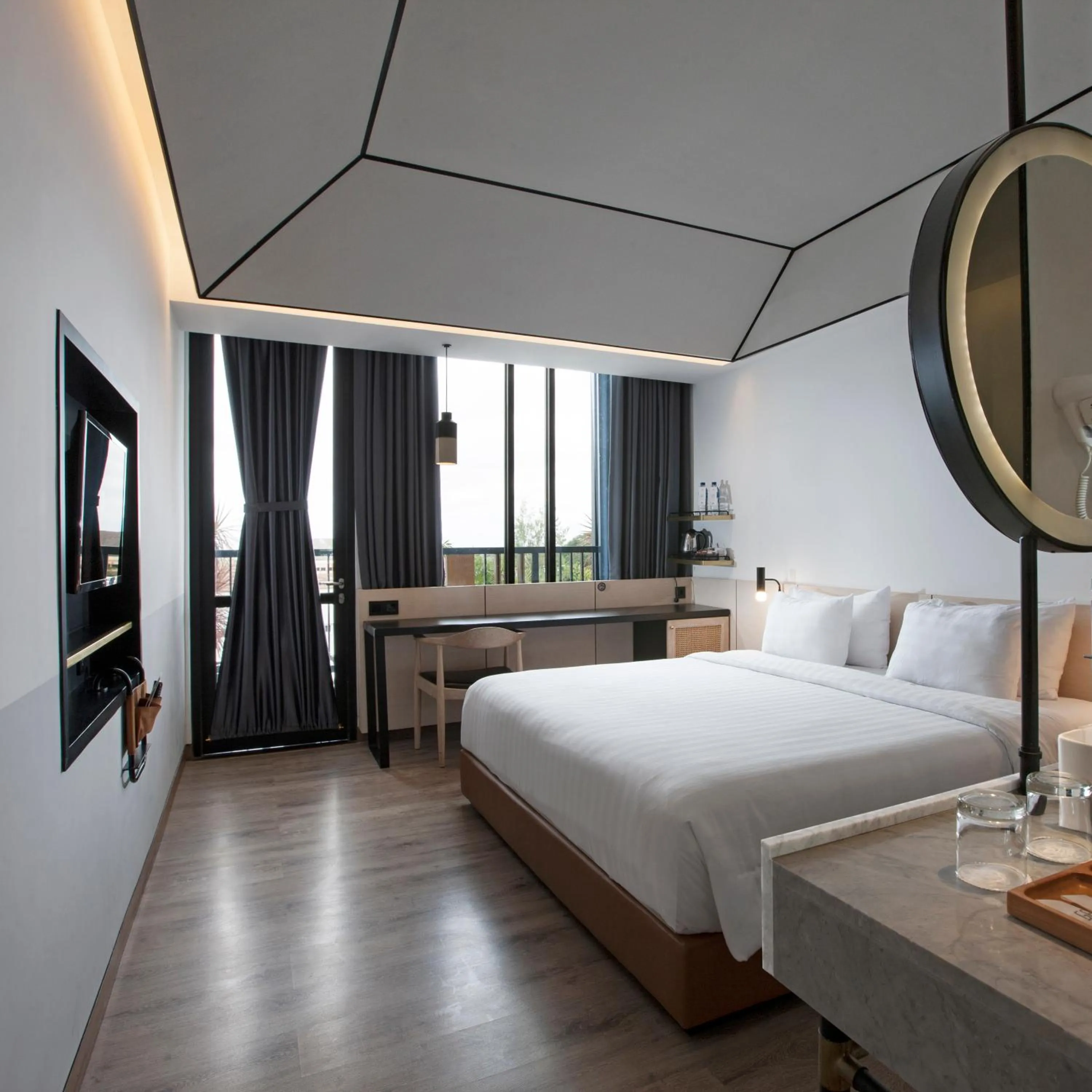 Bed in GAIA Cosmo Hotel