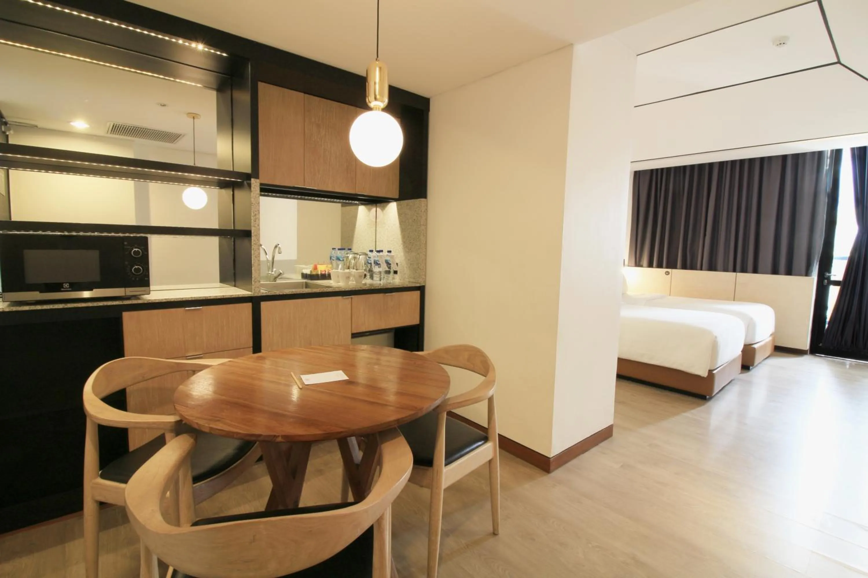 Bed in GAIA Cosmo Hotel