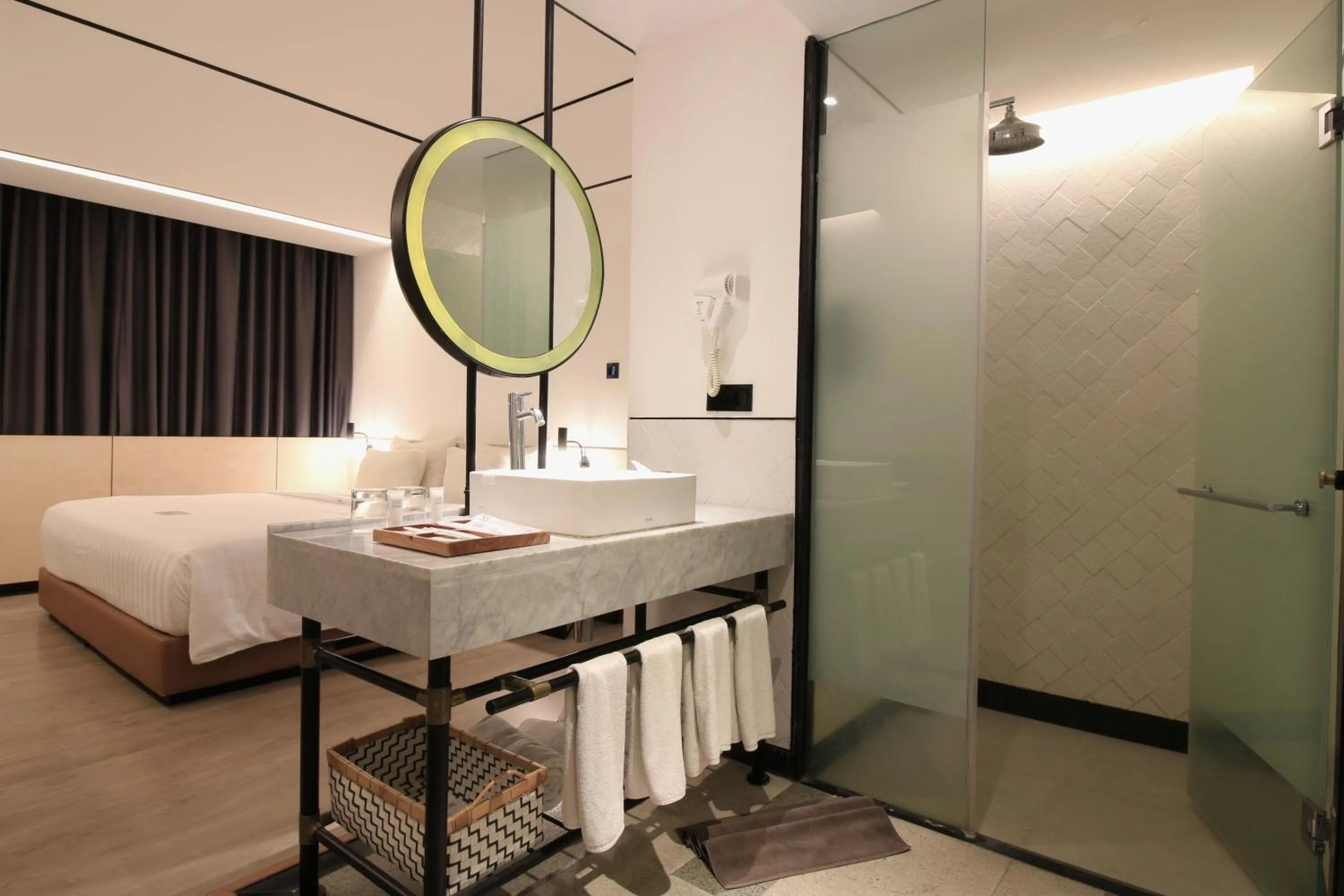 Bed in GAIA Cosmo Hotel