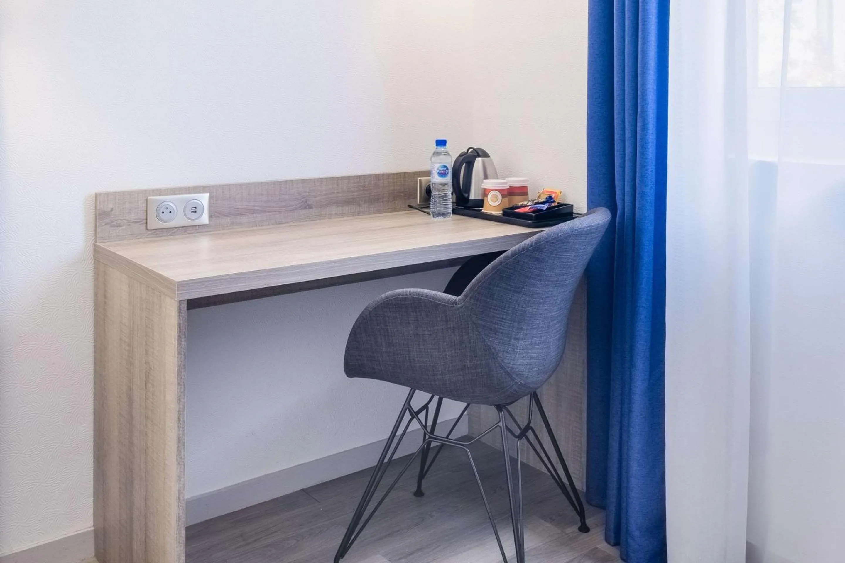 Photo of the whole room in Hotel Le Circuit Le Mans