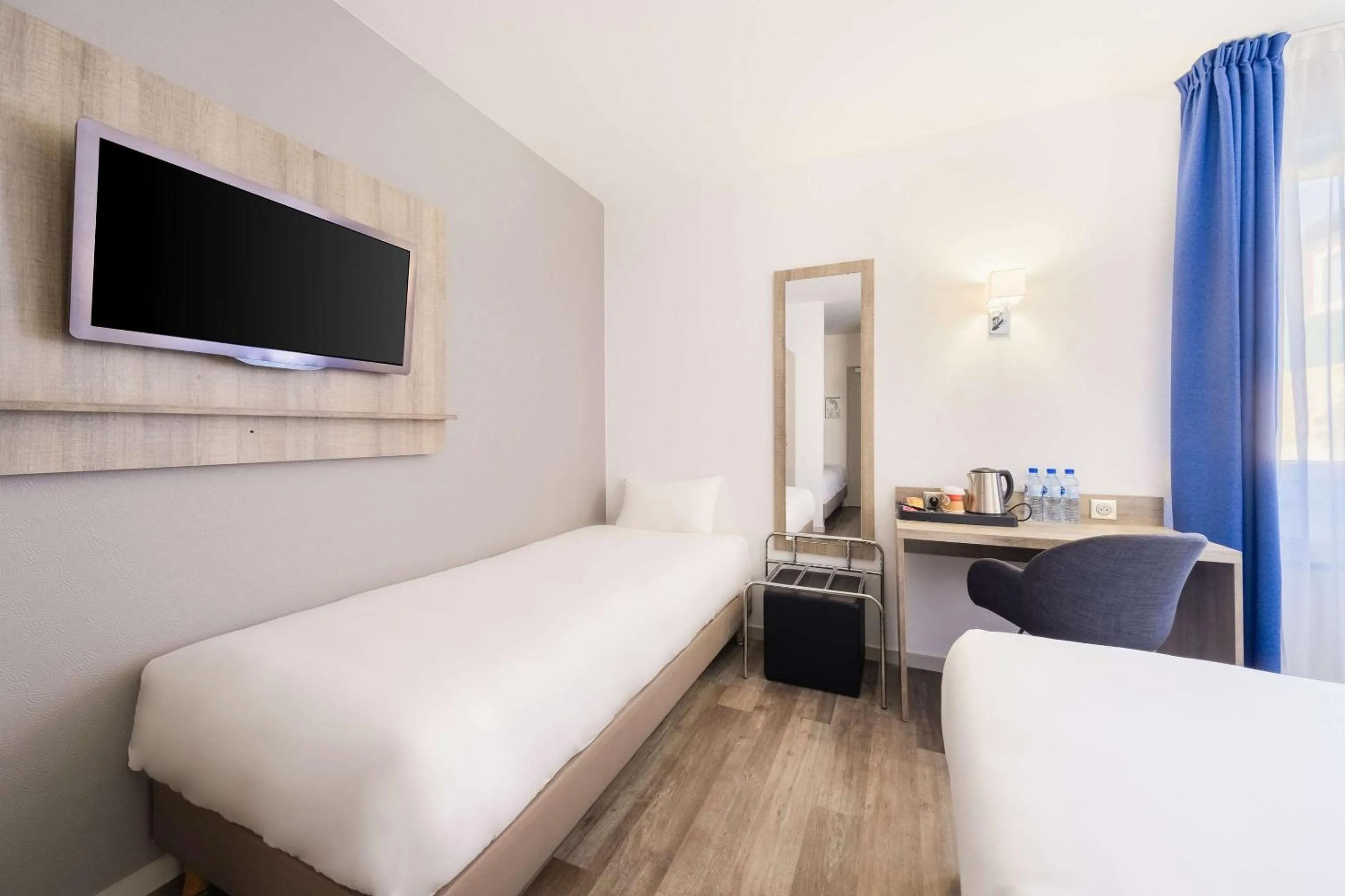 Photo of the whole room, Bed in Hotel Le Circuit Le Mans