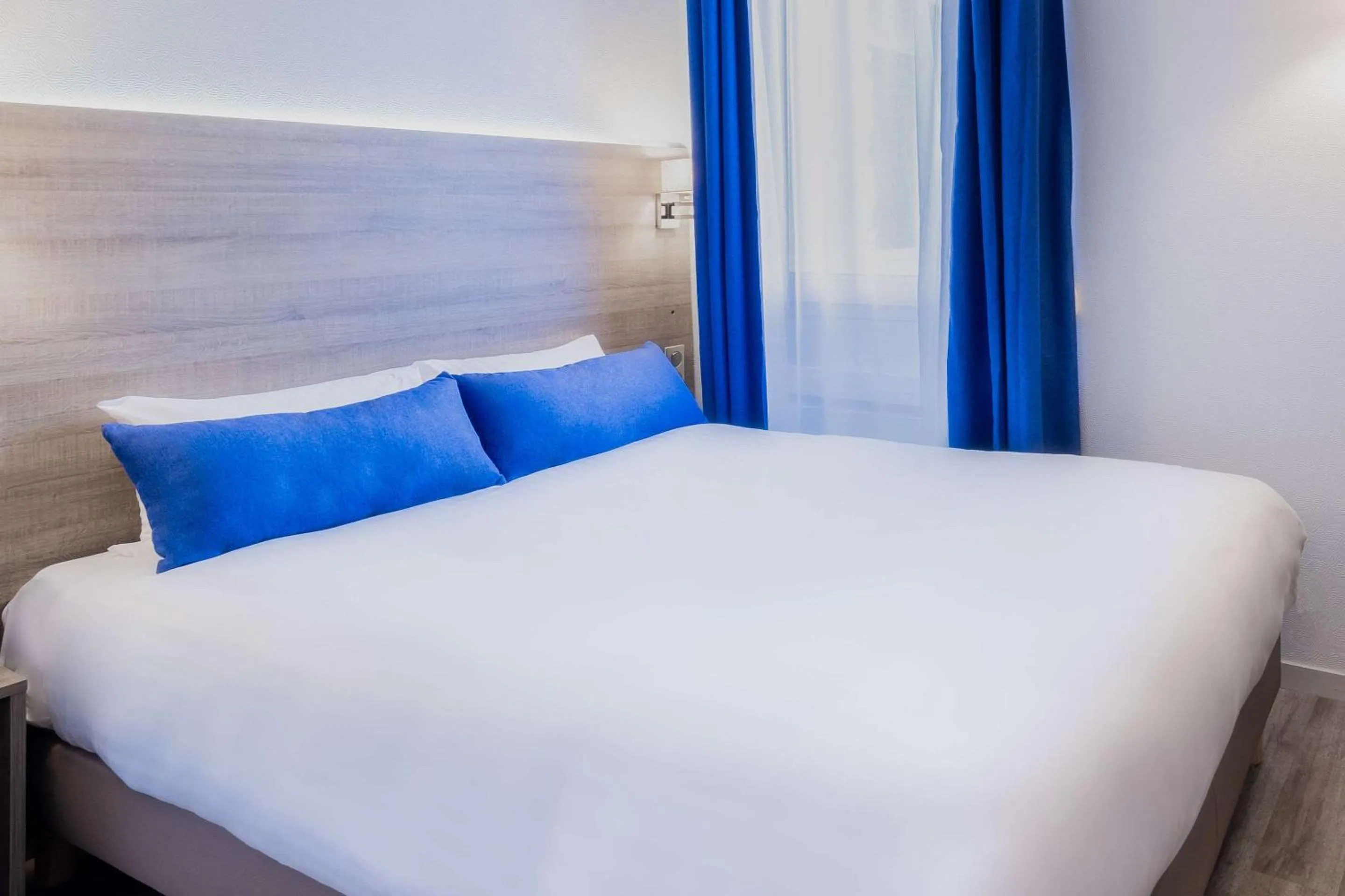 Photo of the whole room, Bed in Hotel Le Circuit Le Mans