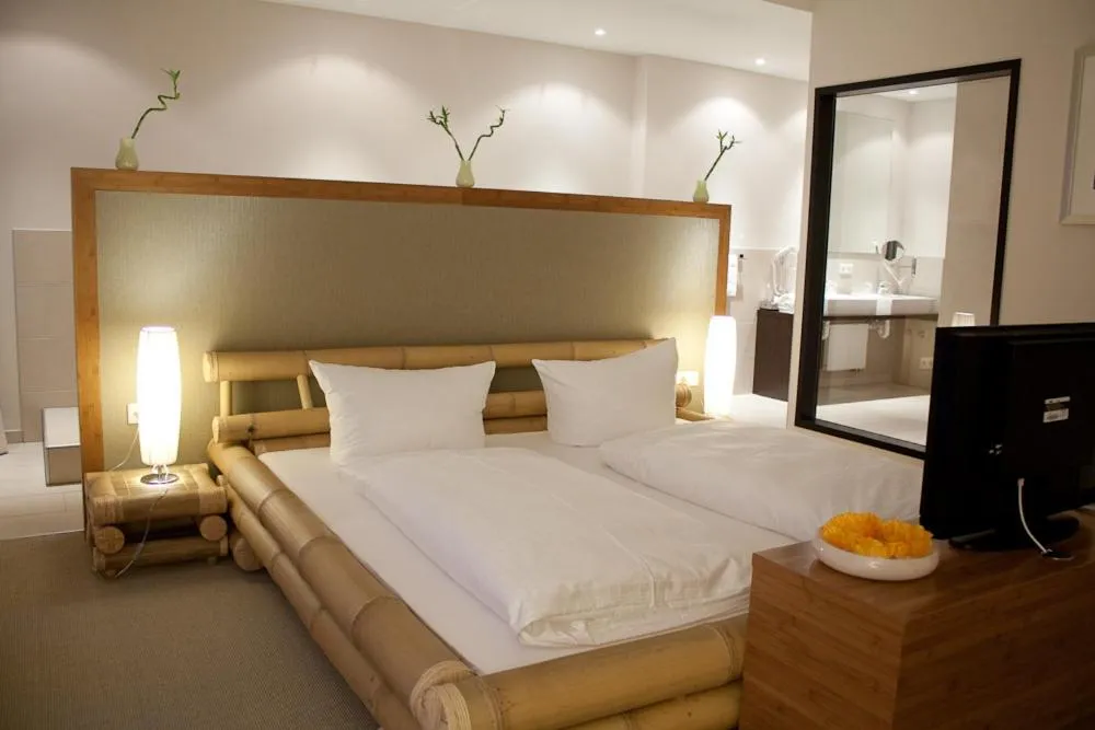 Bed in Friendly Cityhotel Oktopus