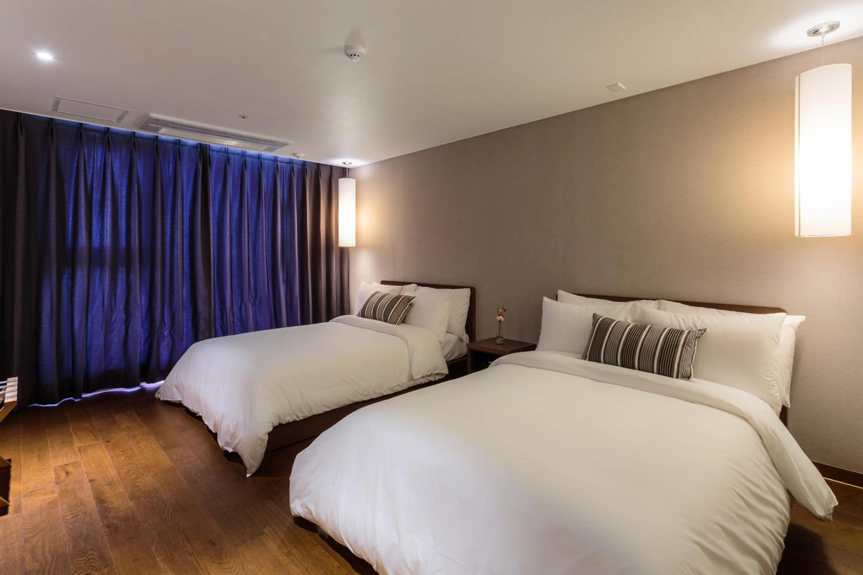 Bedroom in Hotel Alegria Seogwipo