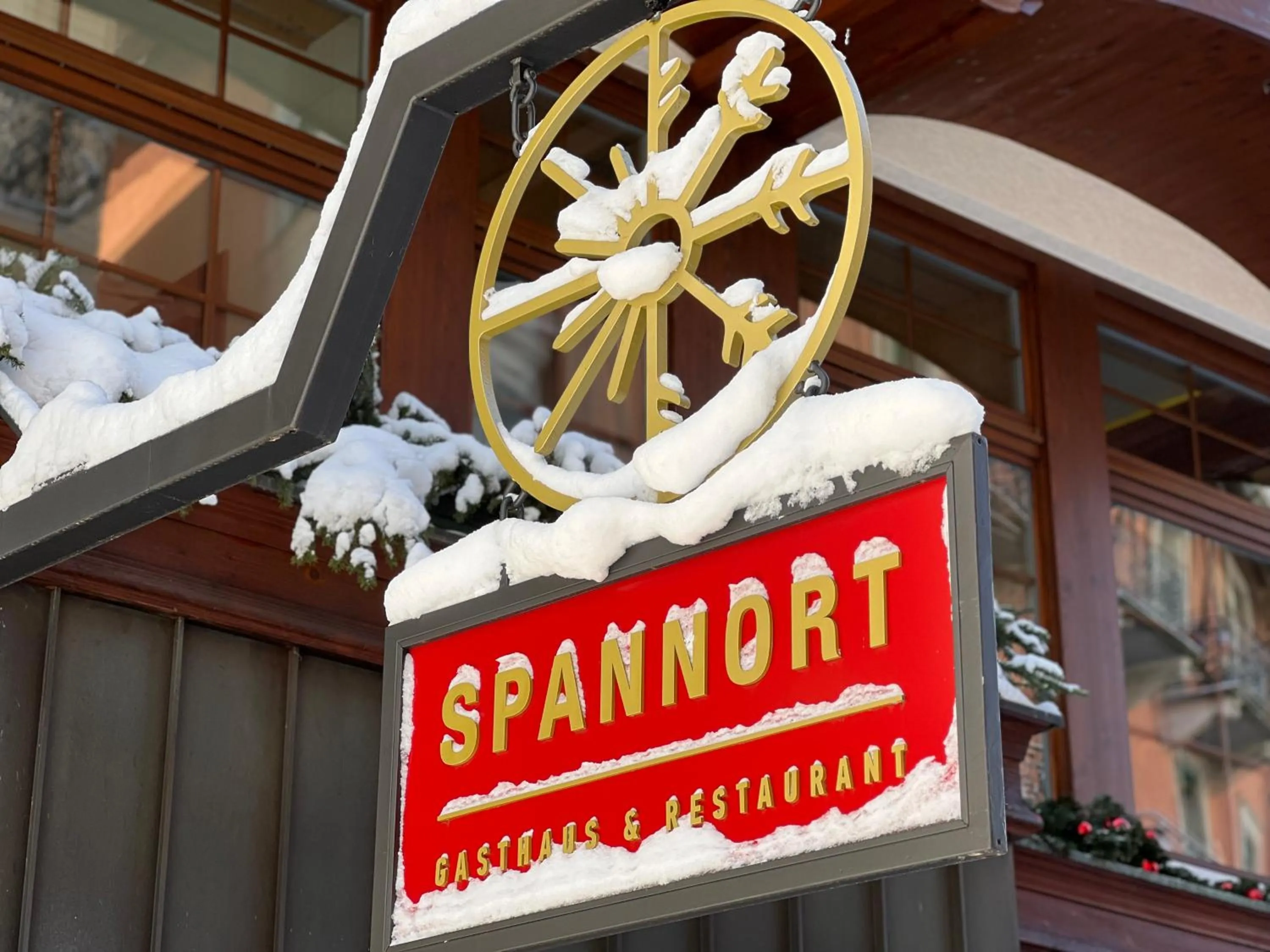 Property logo or sign in SPANNORT family home with common kitchen and self check-in