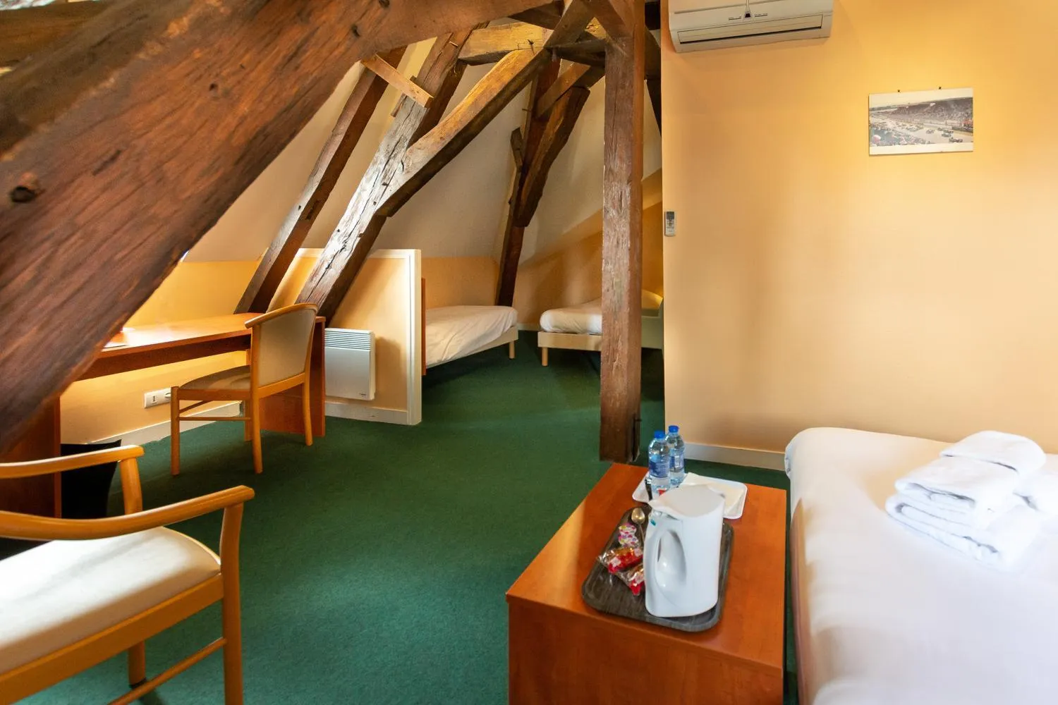 Bed in Logis Hôtel & Restaurant - Le Saint-Louis