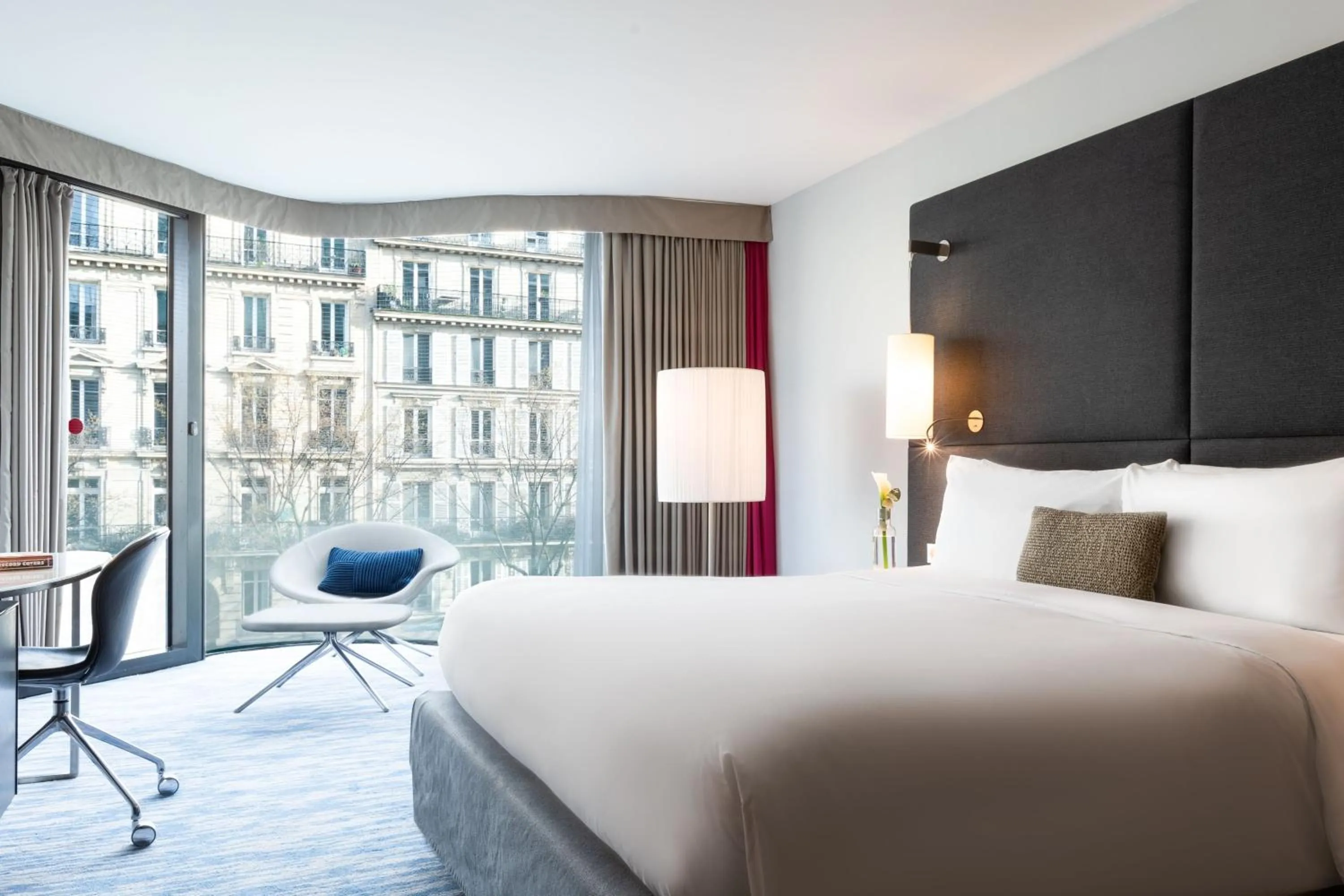 Photo of the whole room, Bed in Renaissance Paris Arc de Triomphe Hotel