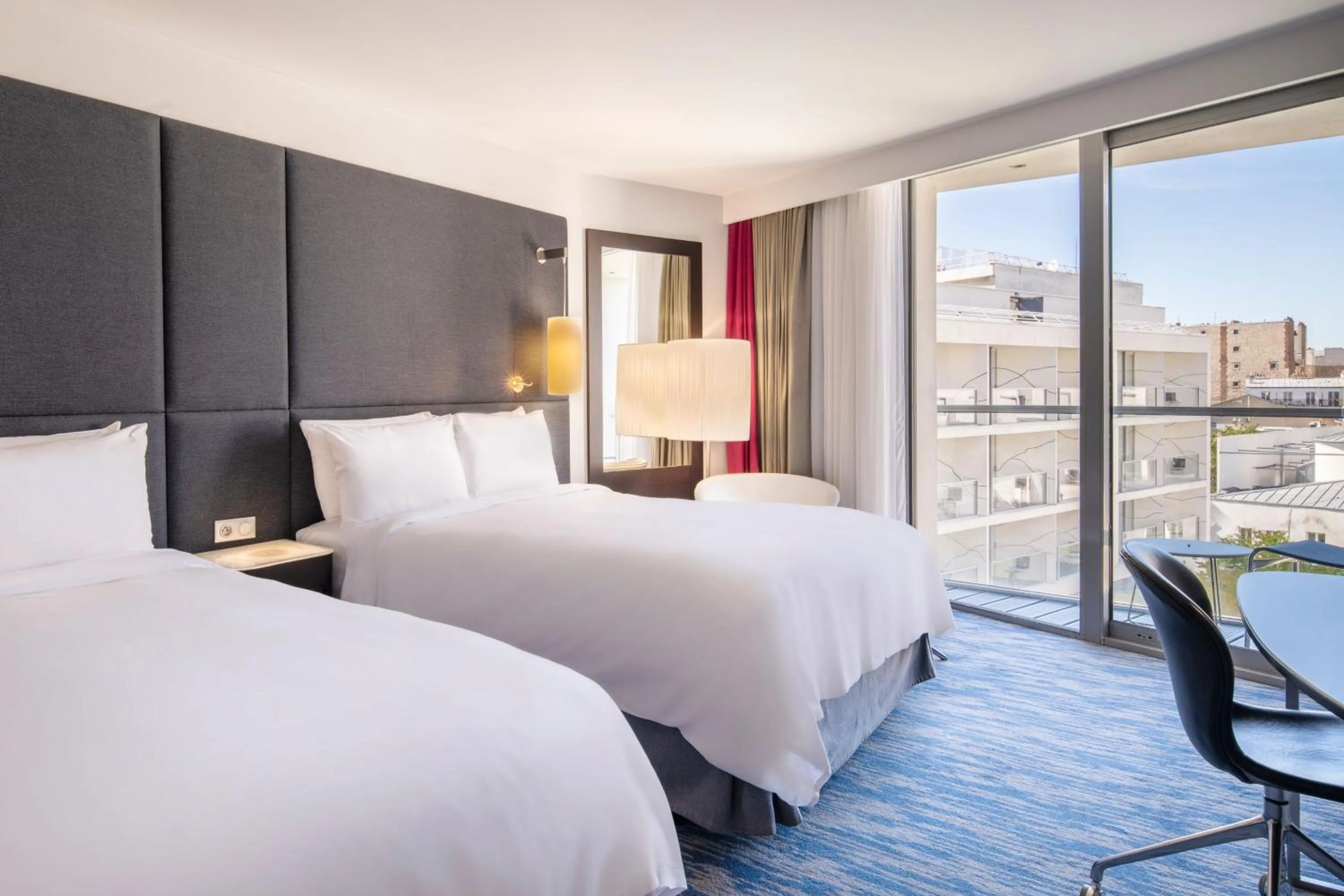 Photo of the whole room, Bed in Renaissance Paris Arc de Triomphe Hotel