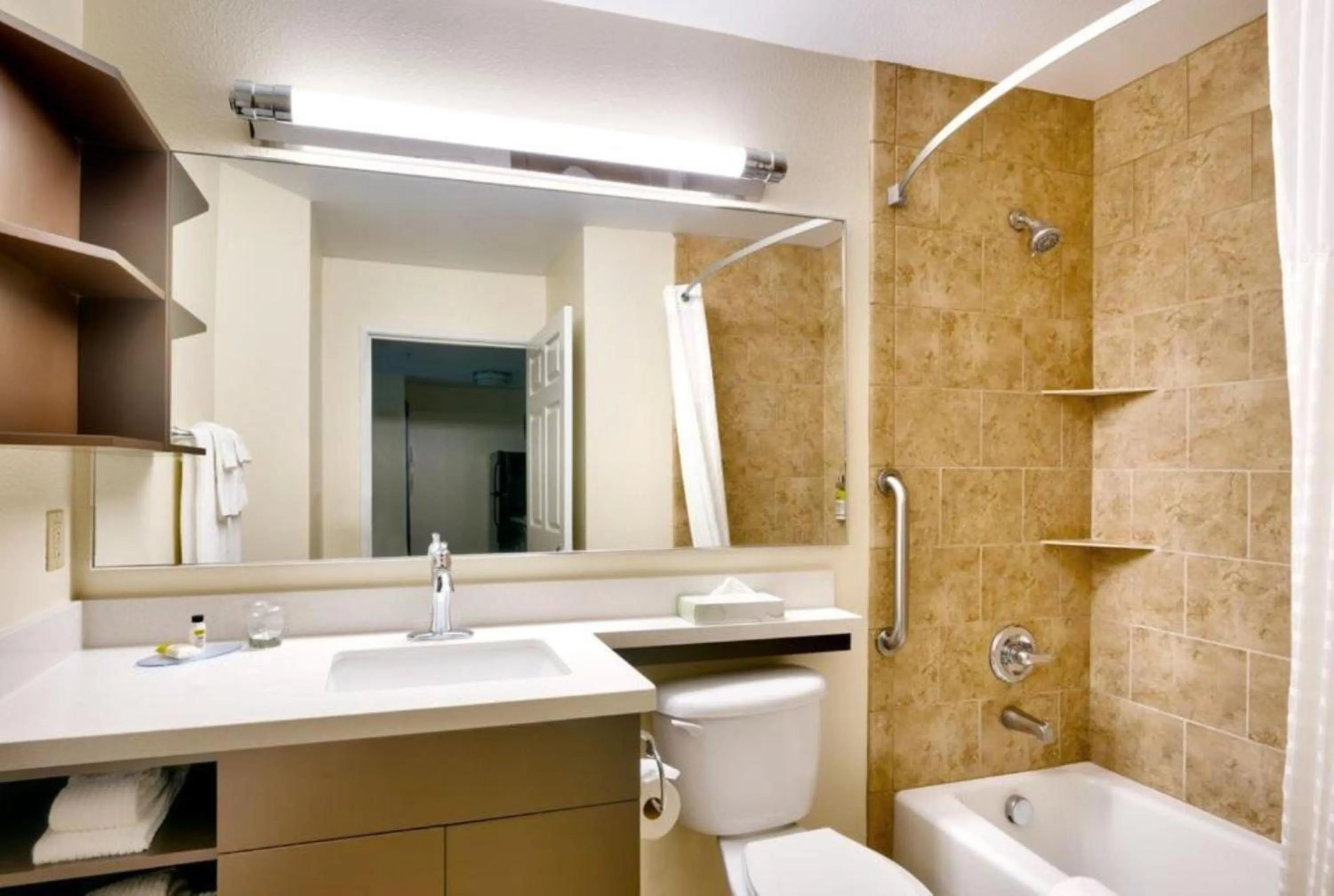 Bathroom in Candlewood Suites Plano East by IHG