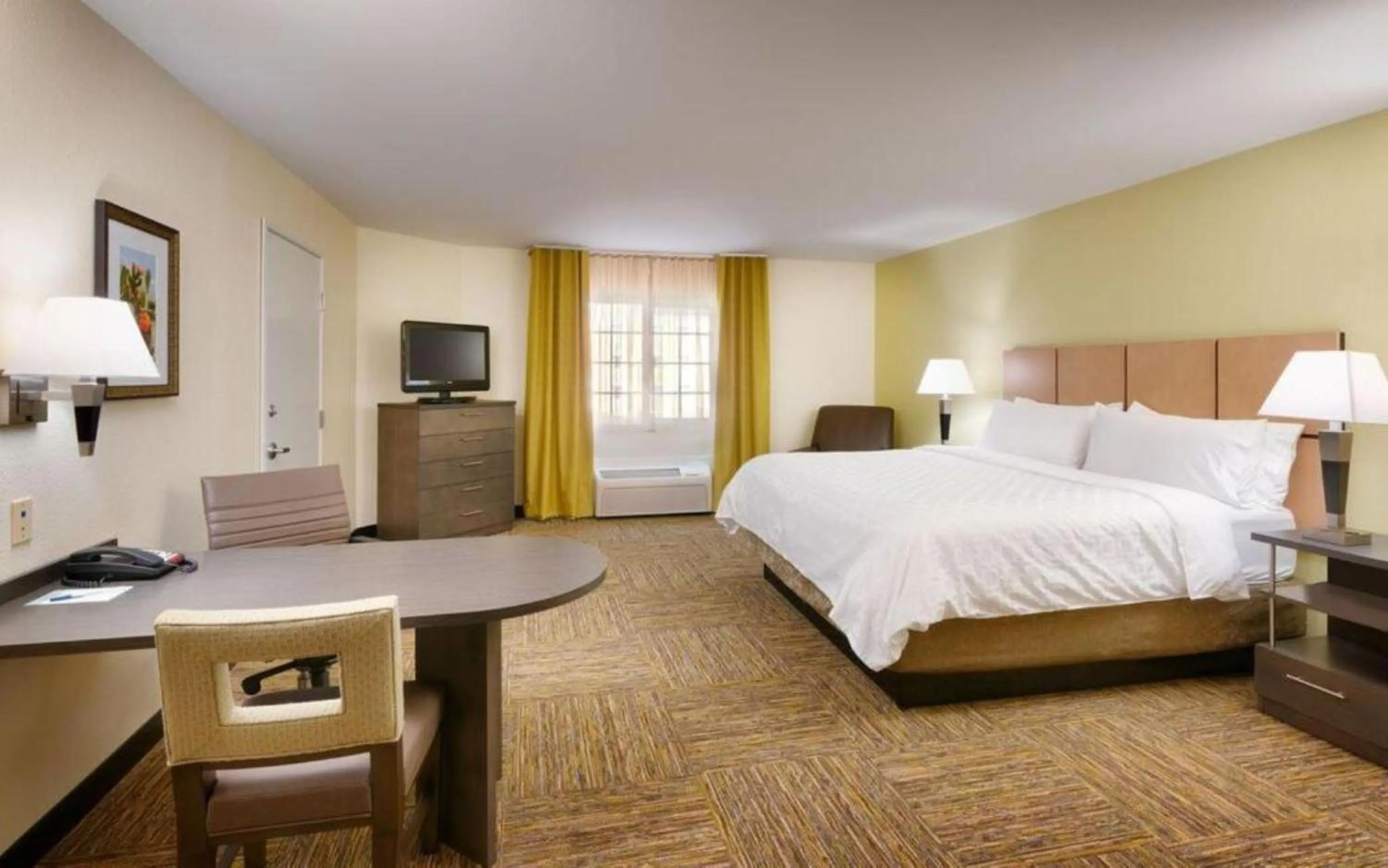 Photo of the whole room, Bed in Candlewood Suites Plano East by IHG