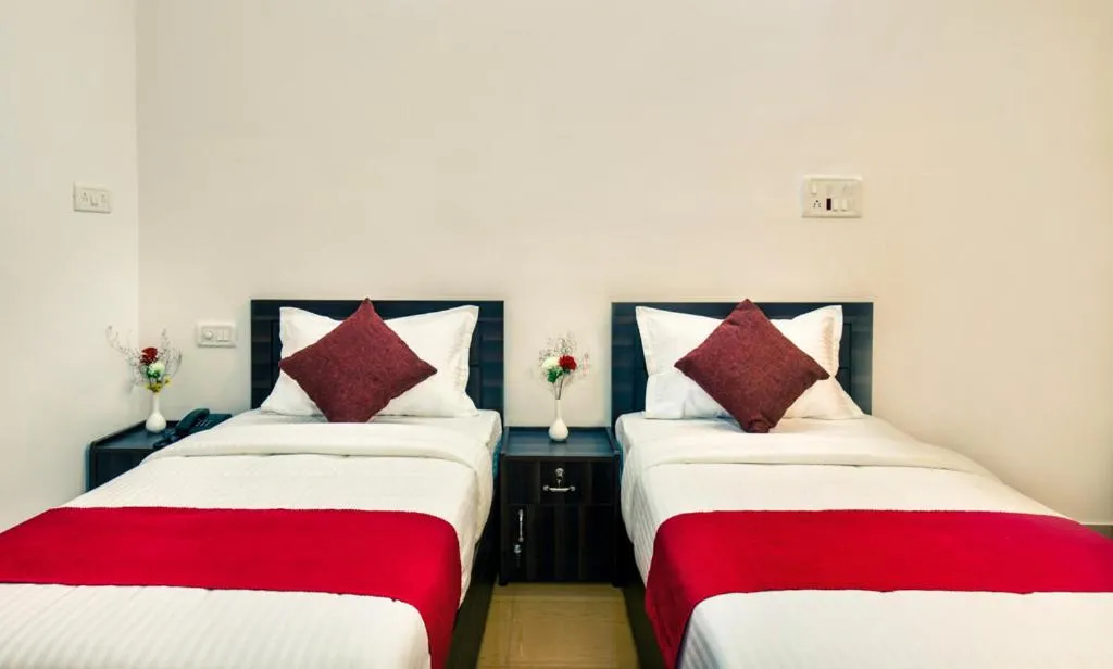 Bed in Wayanad Three Roots Holiday Home Resort