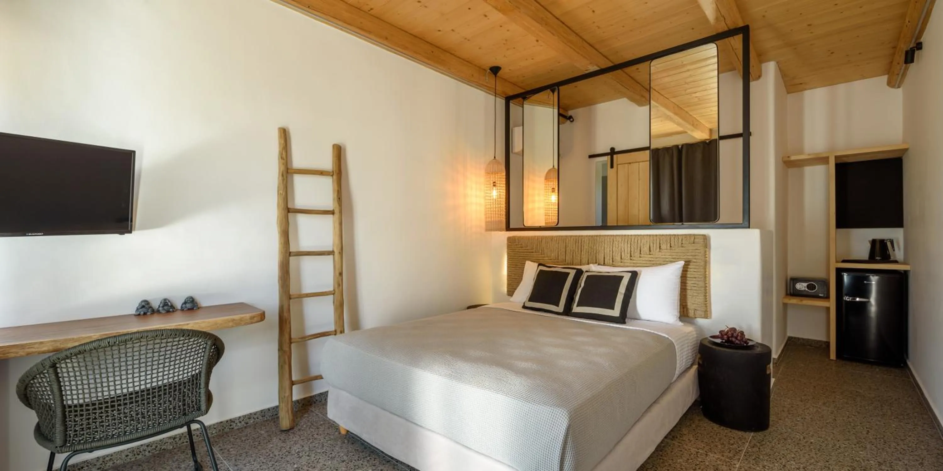 Bed in Olive Mykonos Villas