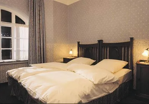 Bedroom, Bed in Hotel Buchenhof