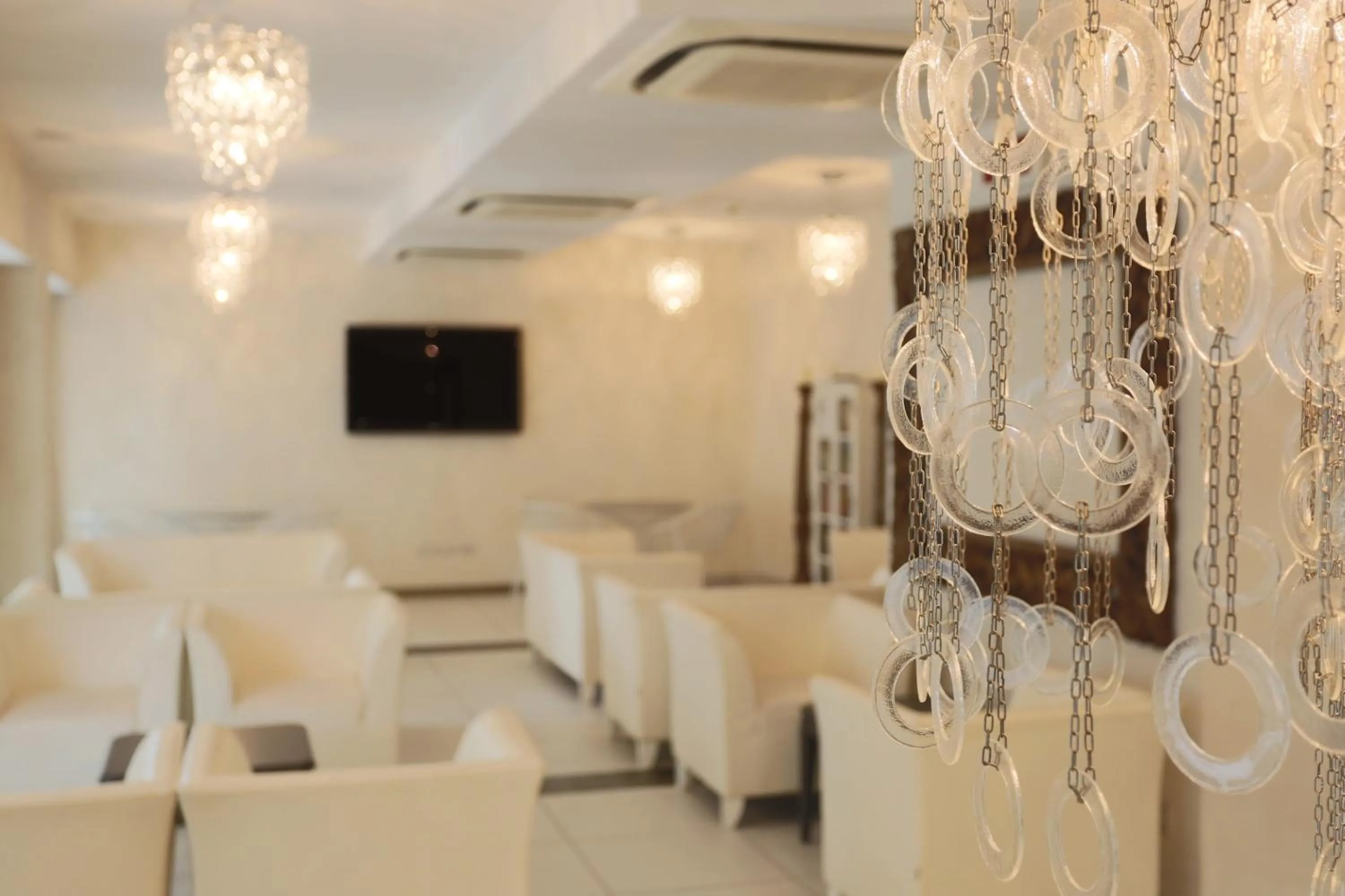 Communal lounge/ TV room in Hotel Caribia Pinarella