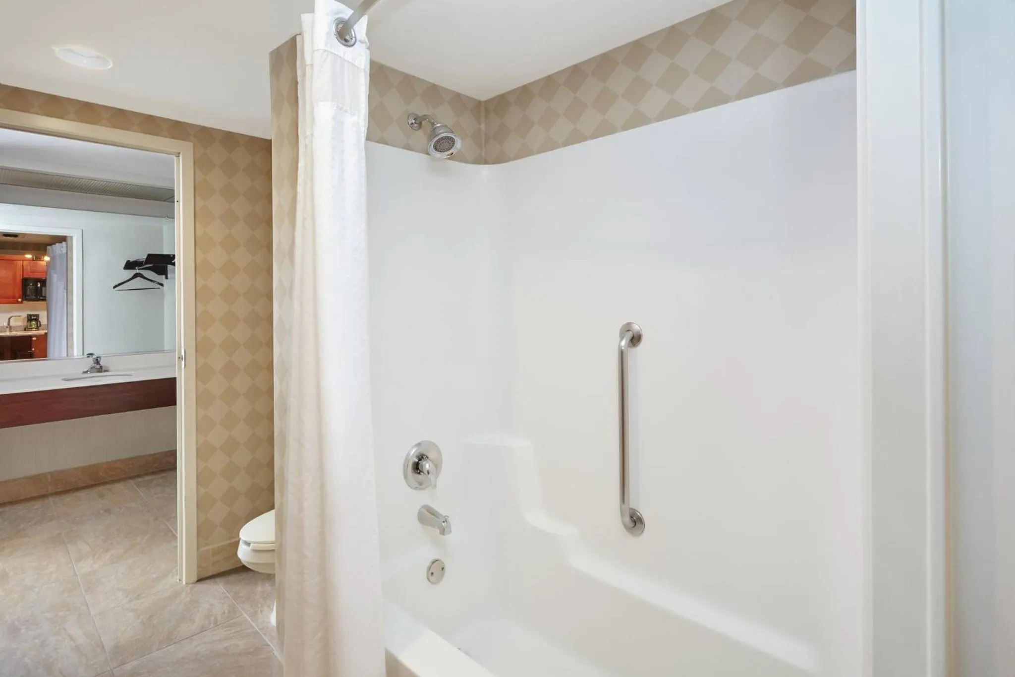 Bathroom in Holiday Inn & Suites Chicago-Carol Stream Wheaton by IHG
