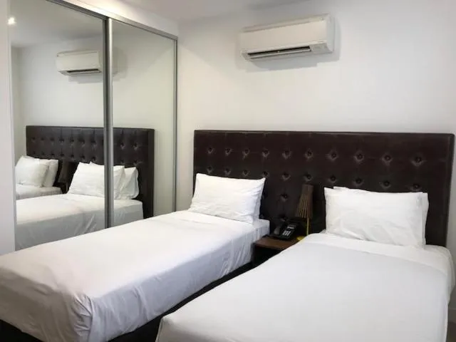 Bed in Whitehorse Apartments Hotel