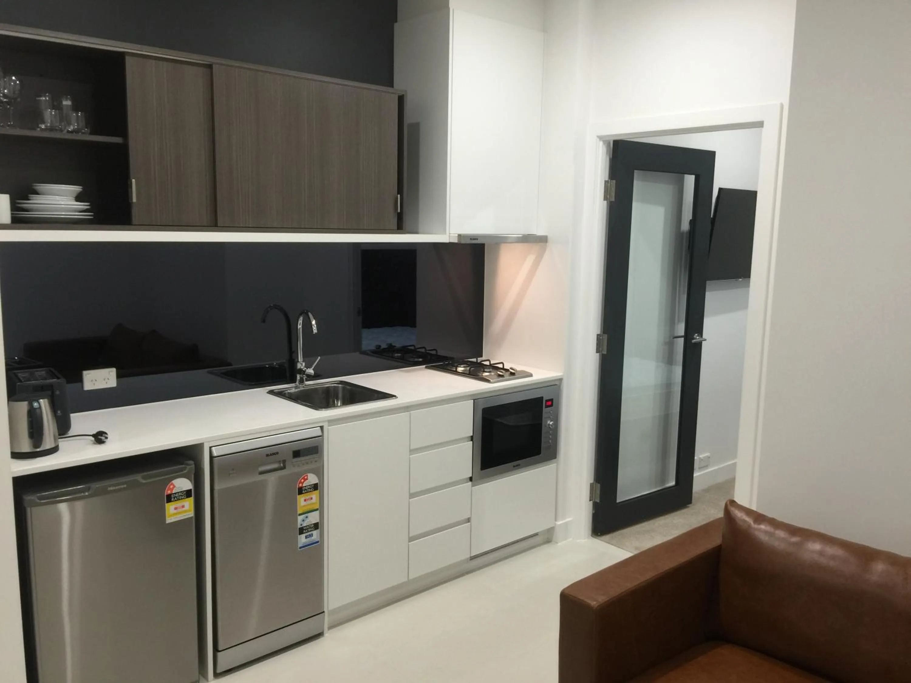 Kitchen or kitchenette in Whitehorse Apartments Hotel