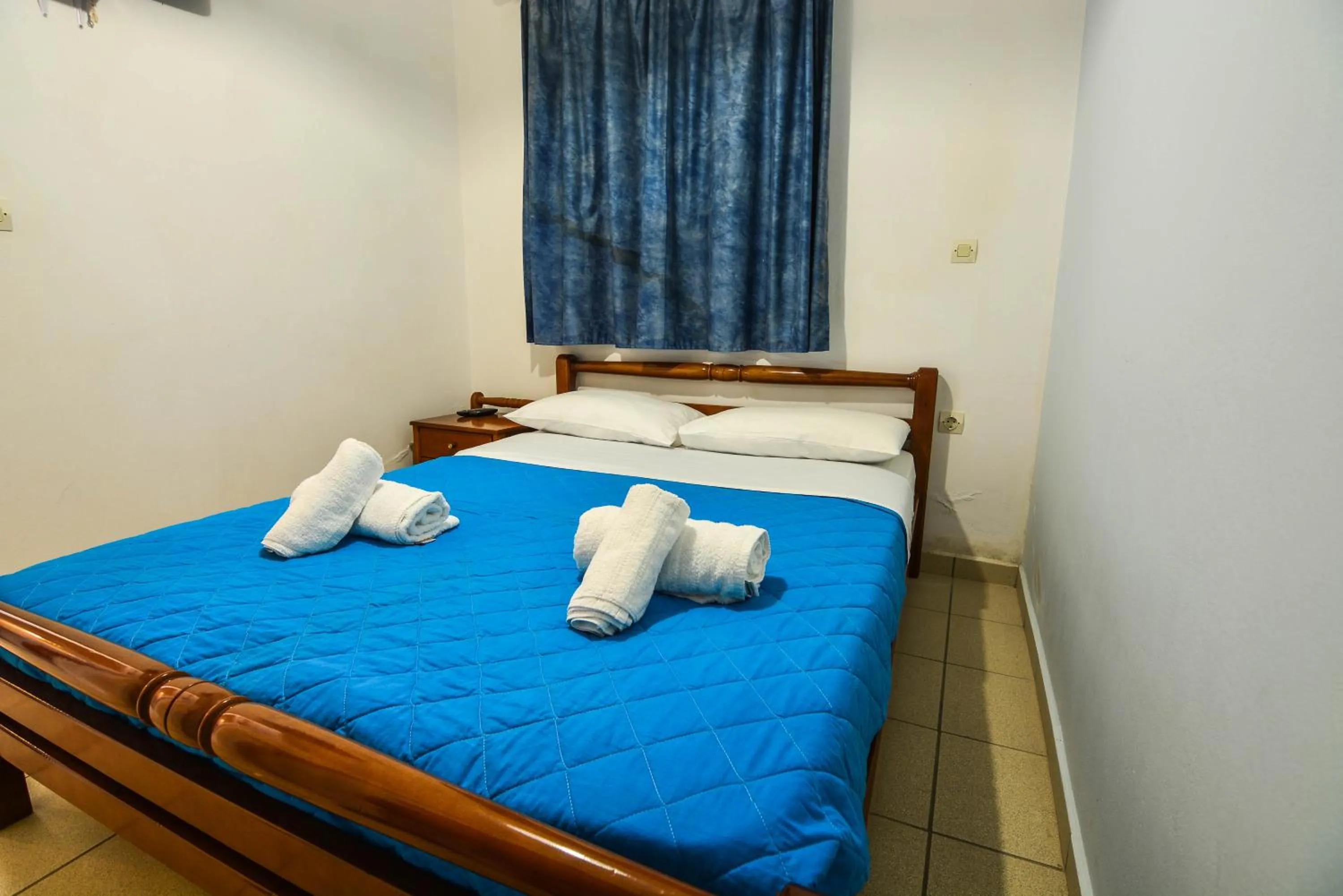 Bed in Epavlis Apartments