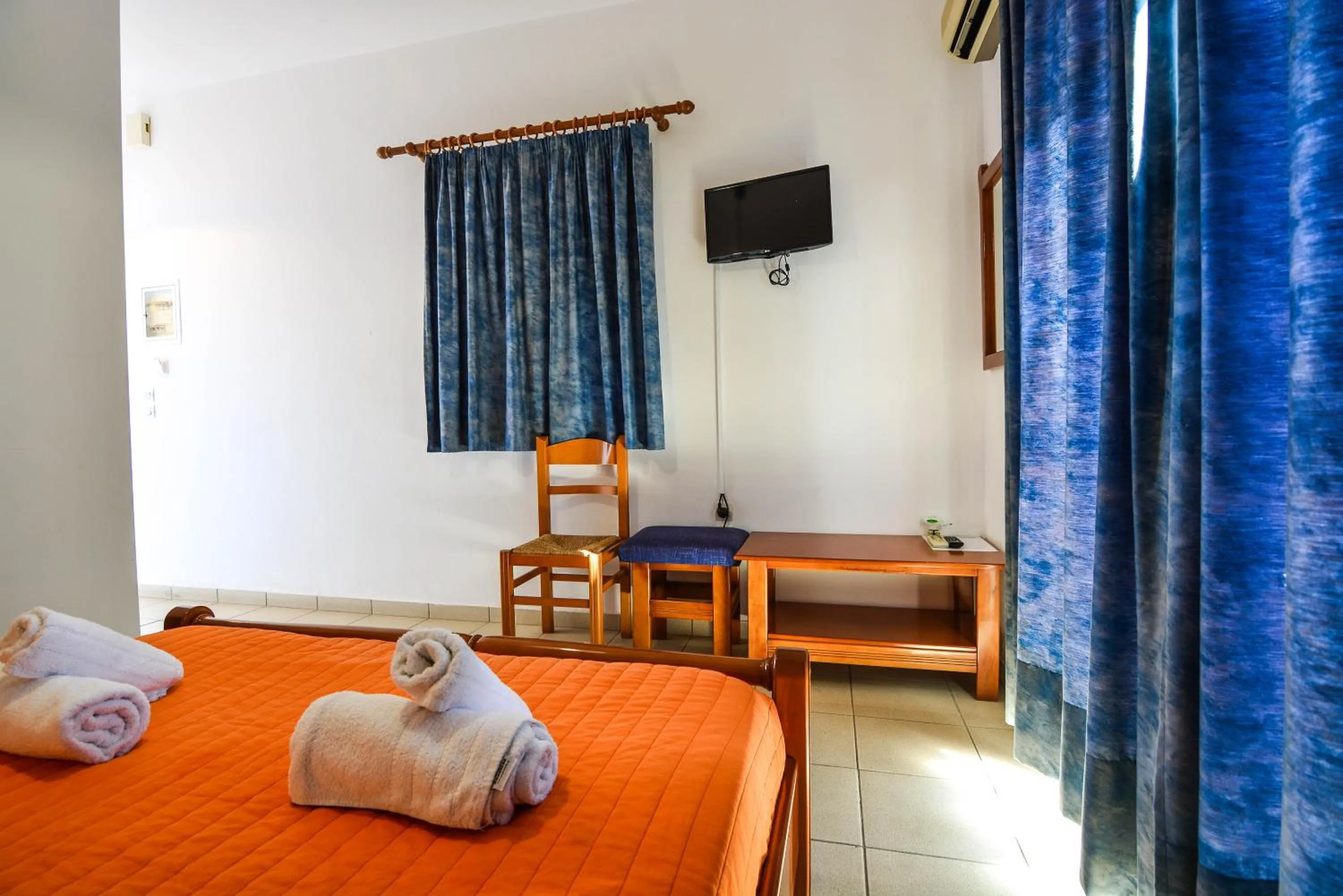 Bed in Epavlis Apartments