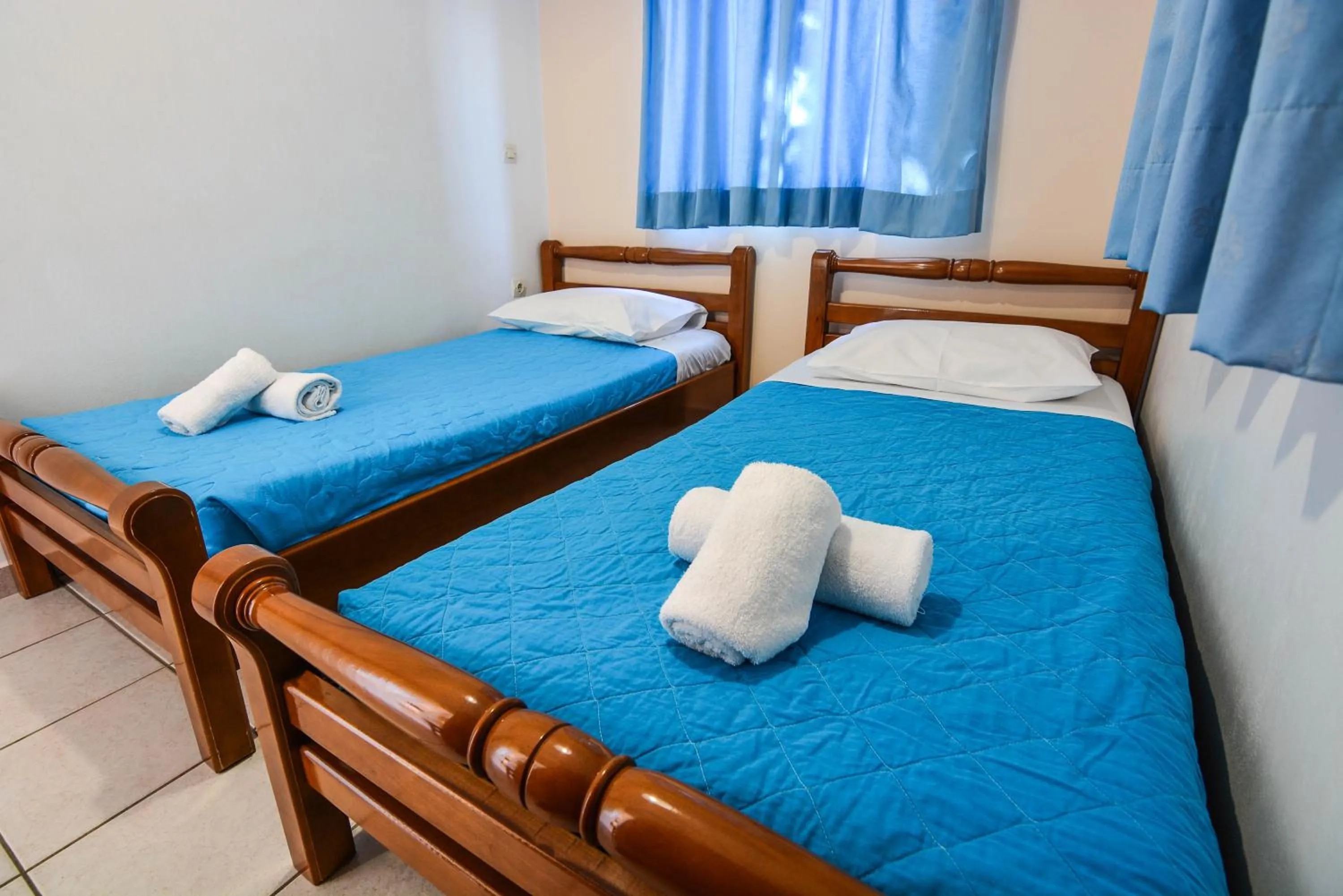 Bed in Epavlis Apartments