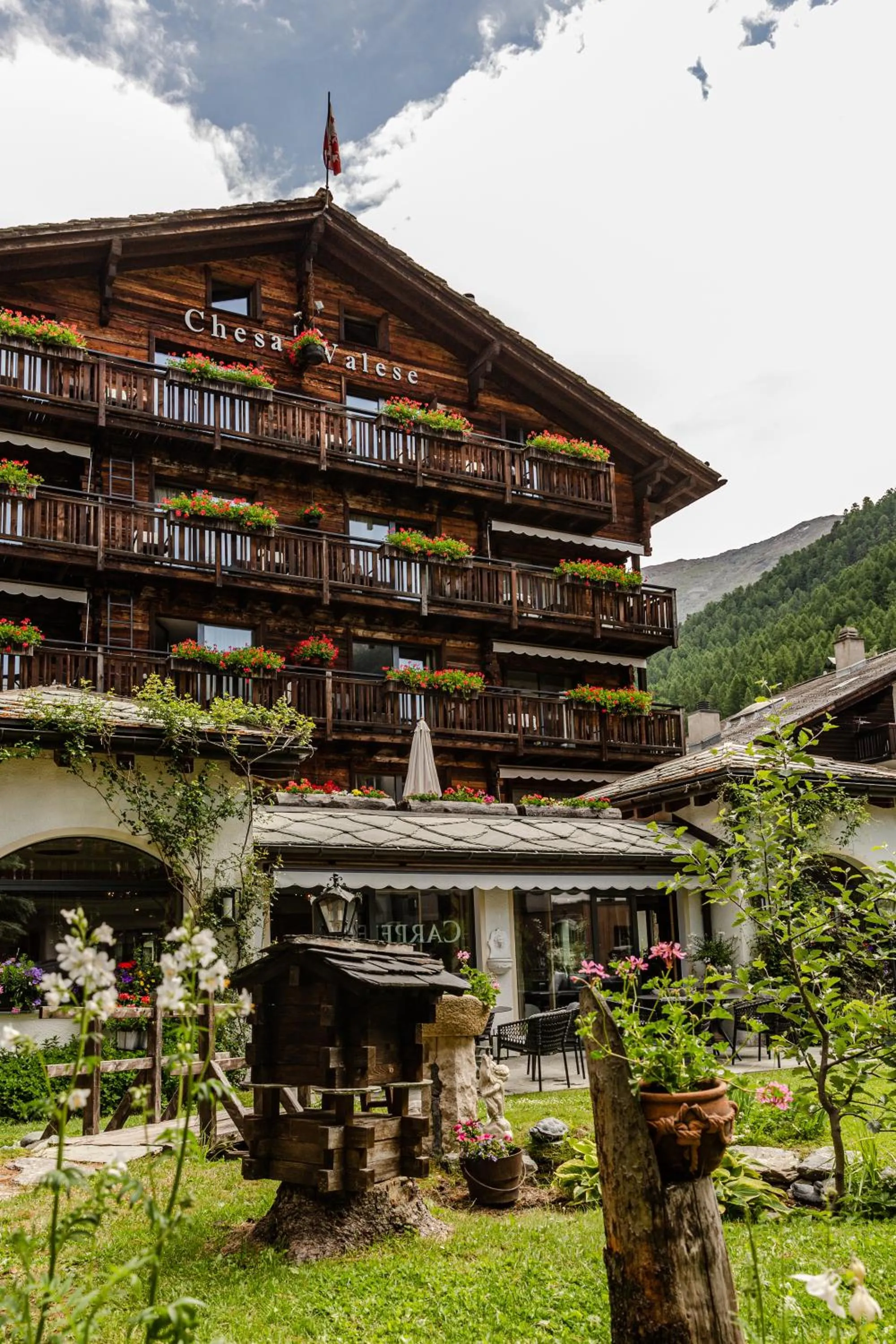 Garden view in Chesa Valese by Sisters Zermatt