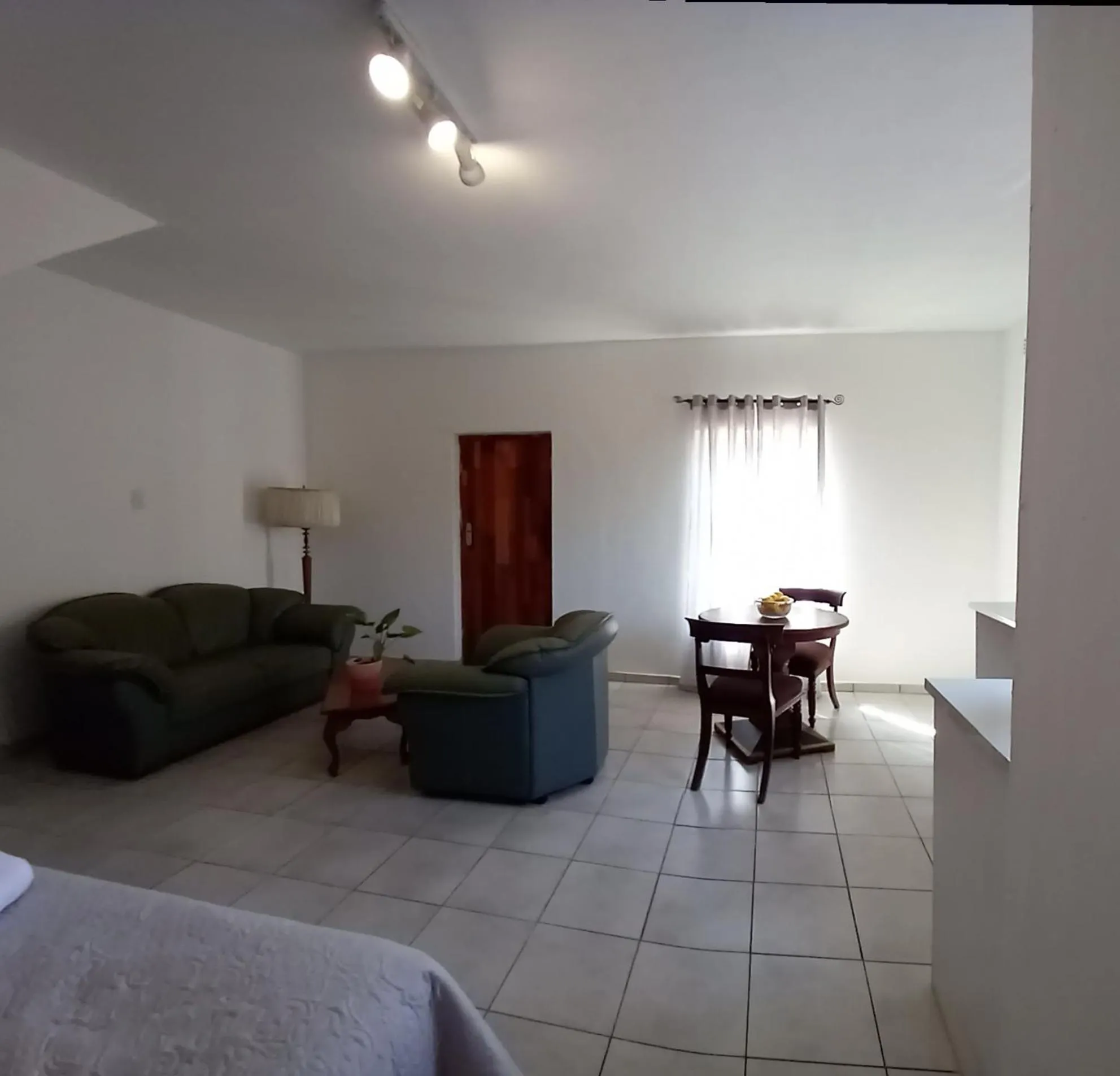 Seating area, Bed in At The View B&B