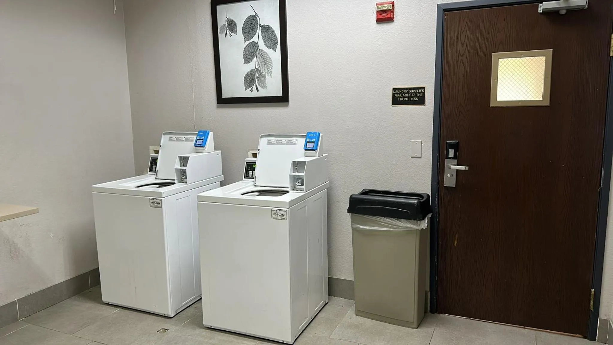 washing machine in Country Inn & Suites by Radisson, Austin North Pflugerville , TX