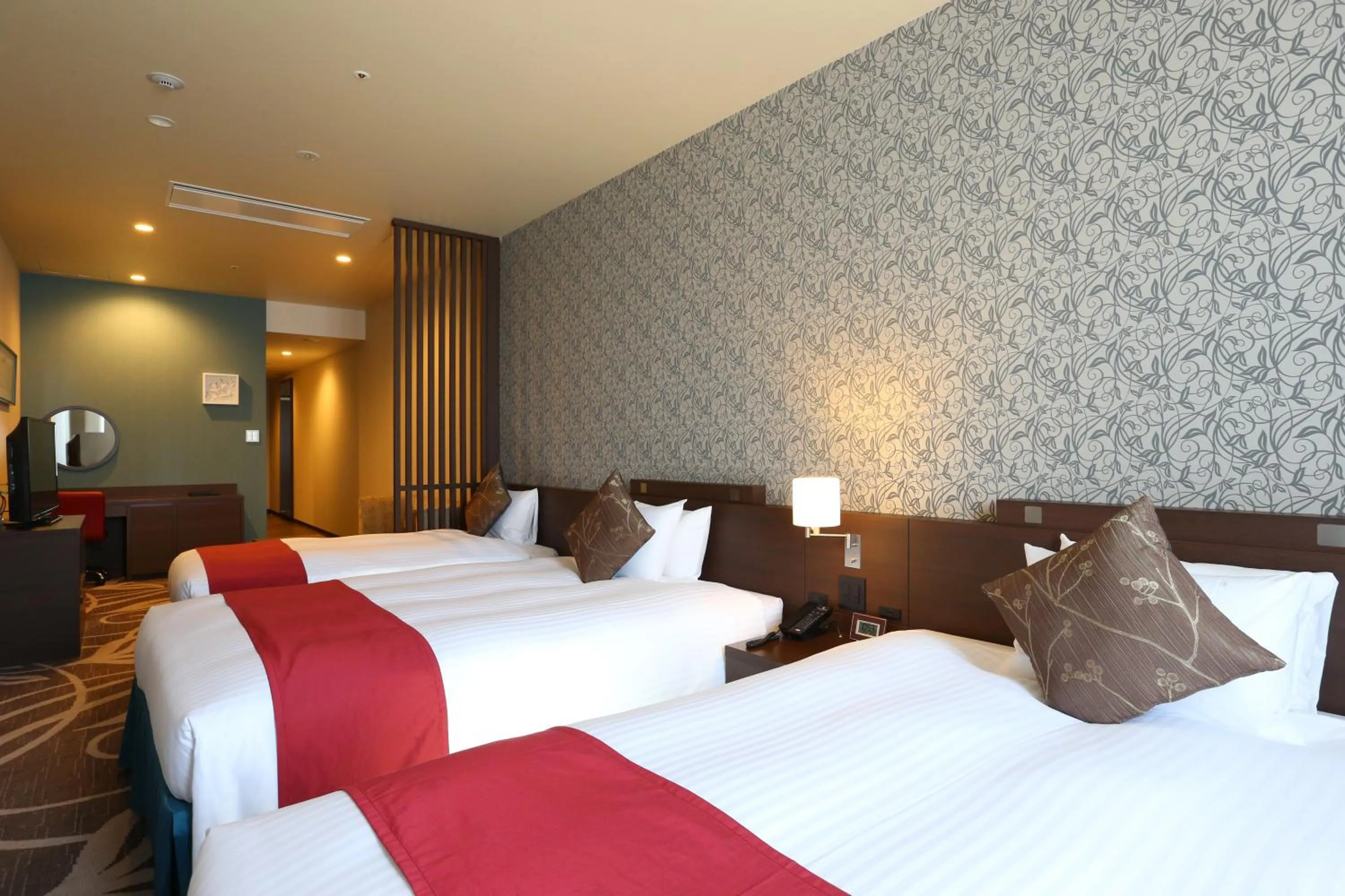 Bed in Hotel La Raison Osaka