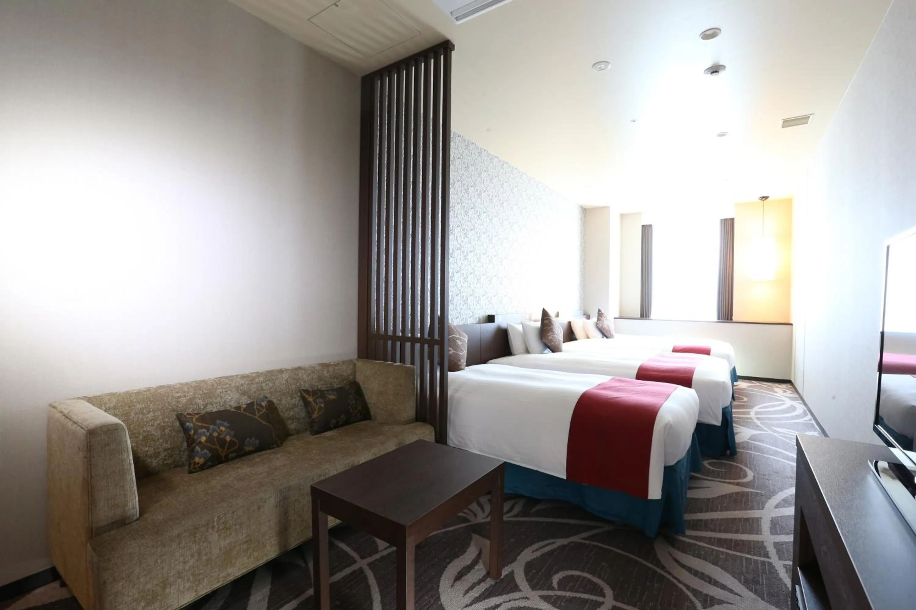 Bed in Hotel La Raison Osaka