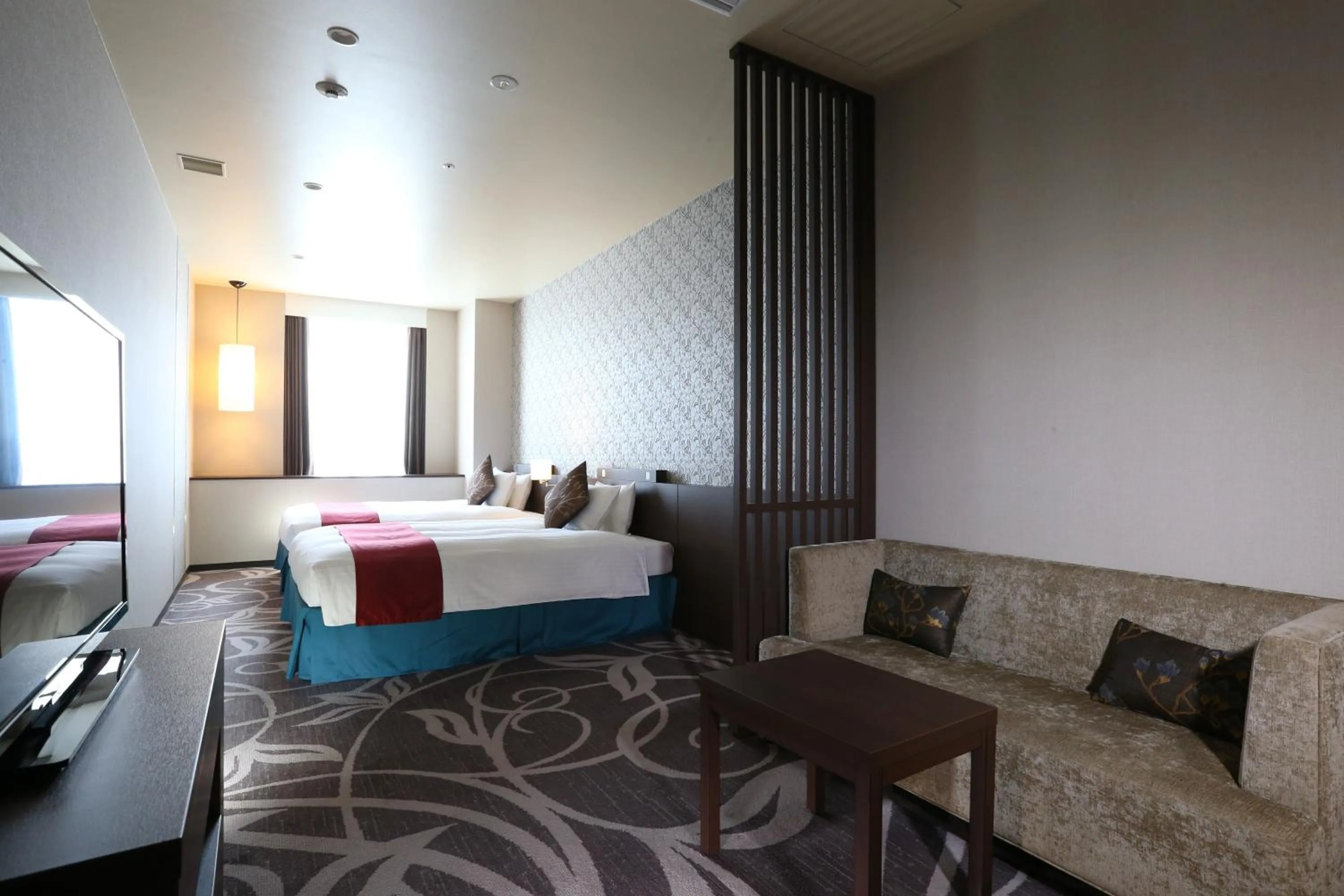 Living room, Bed in Hotel La Raison Osaka