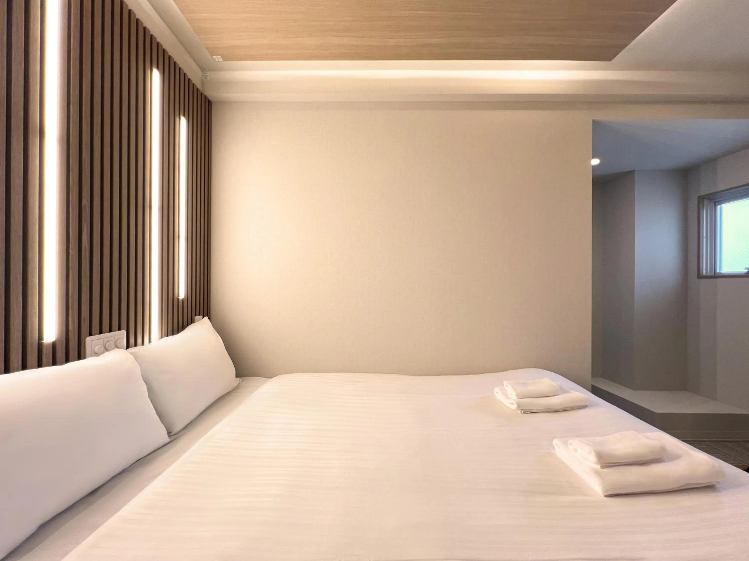 Bed in Osaka Ebisu Hotel