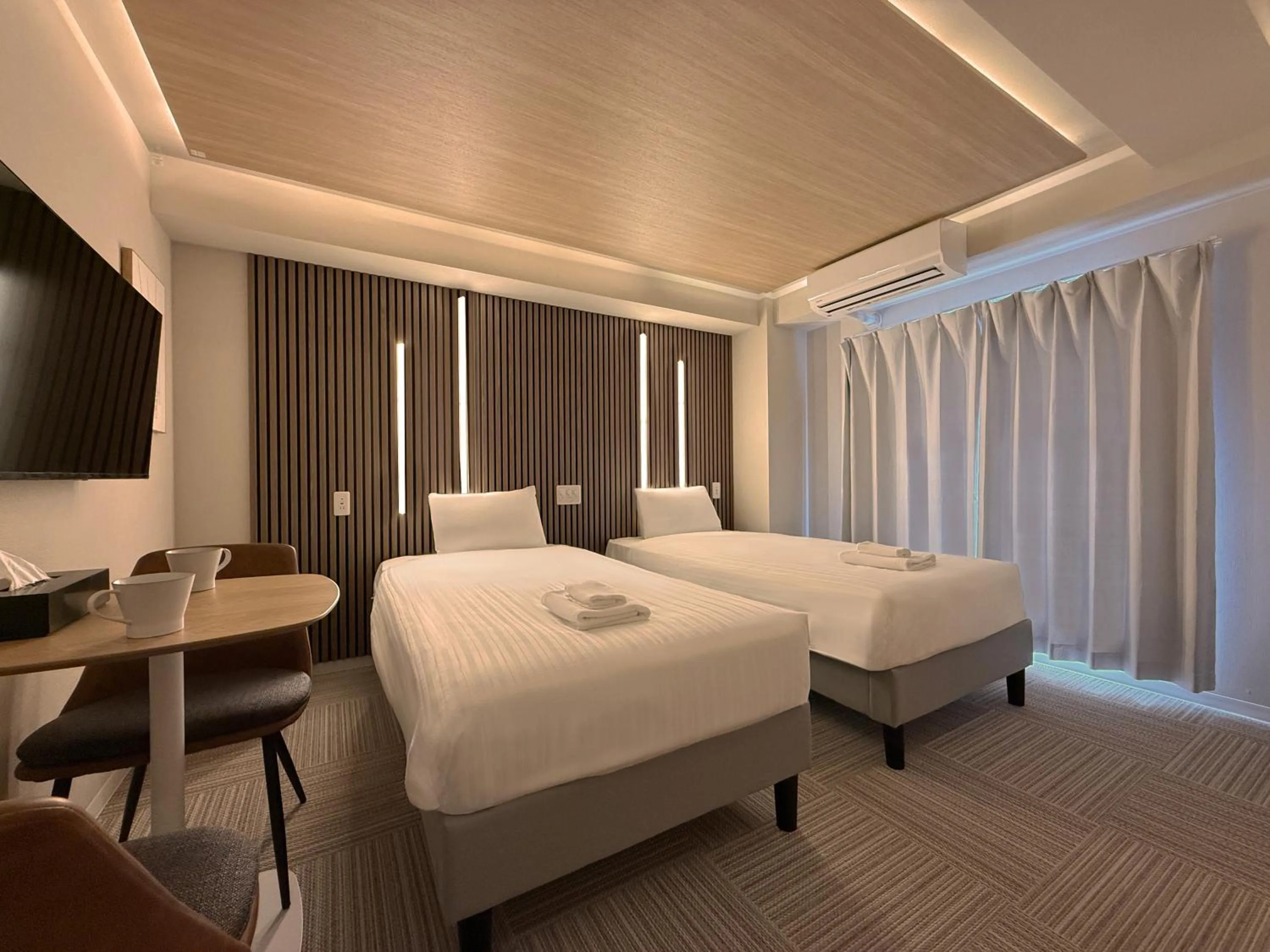 Bed in Osaka Ebisu Hotel