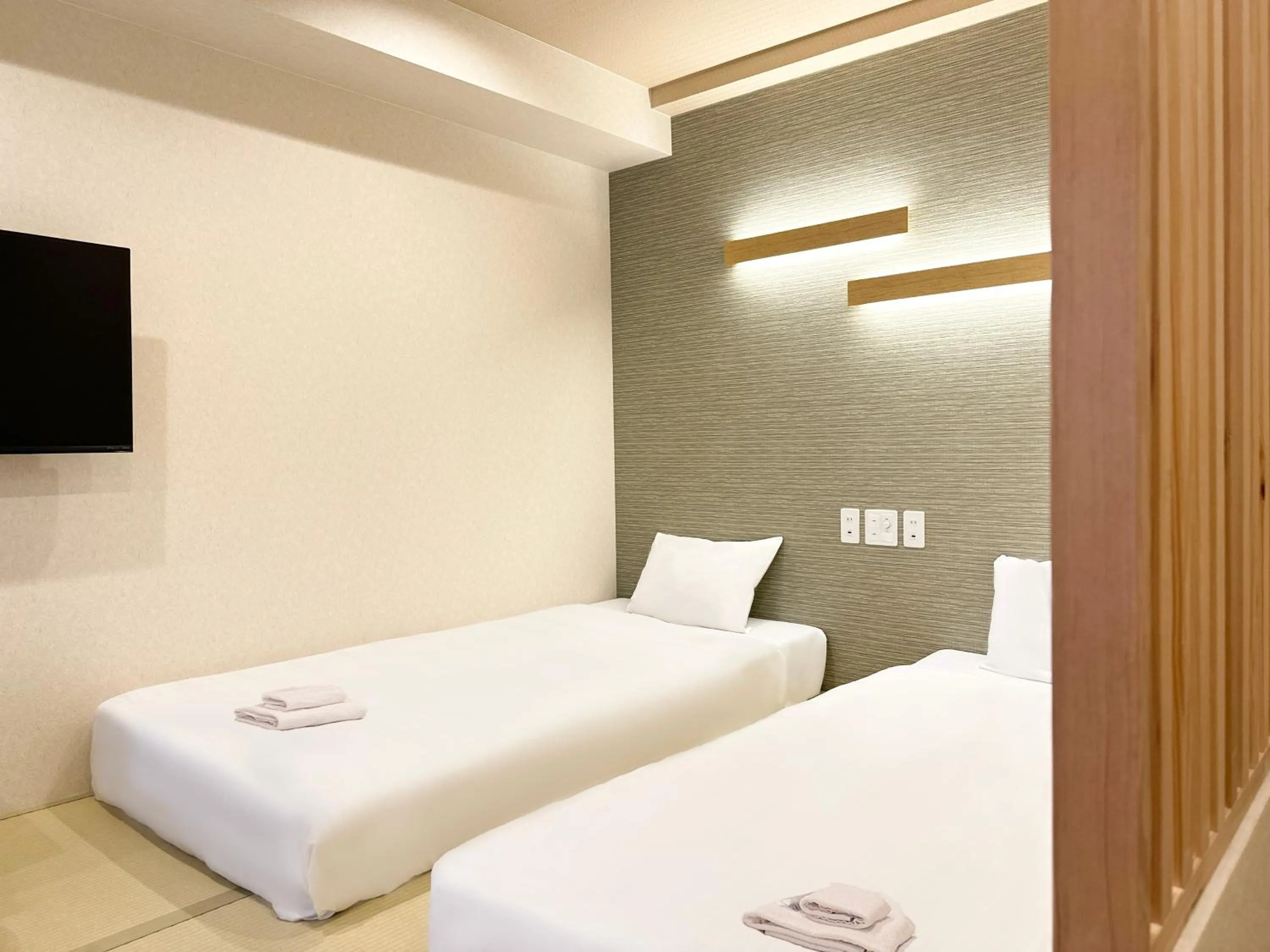 Bed in Osaka Ebisu Hotel