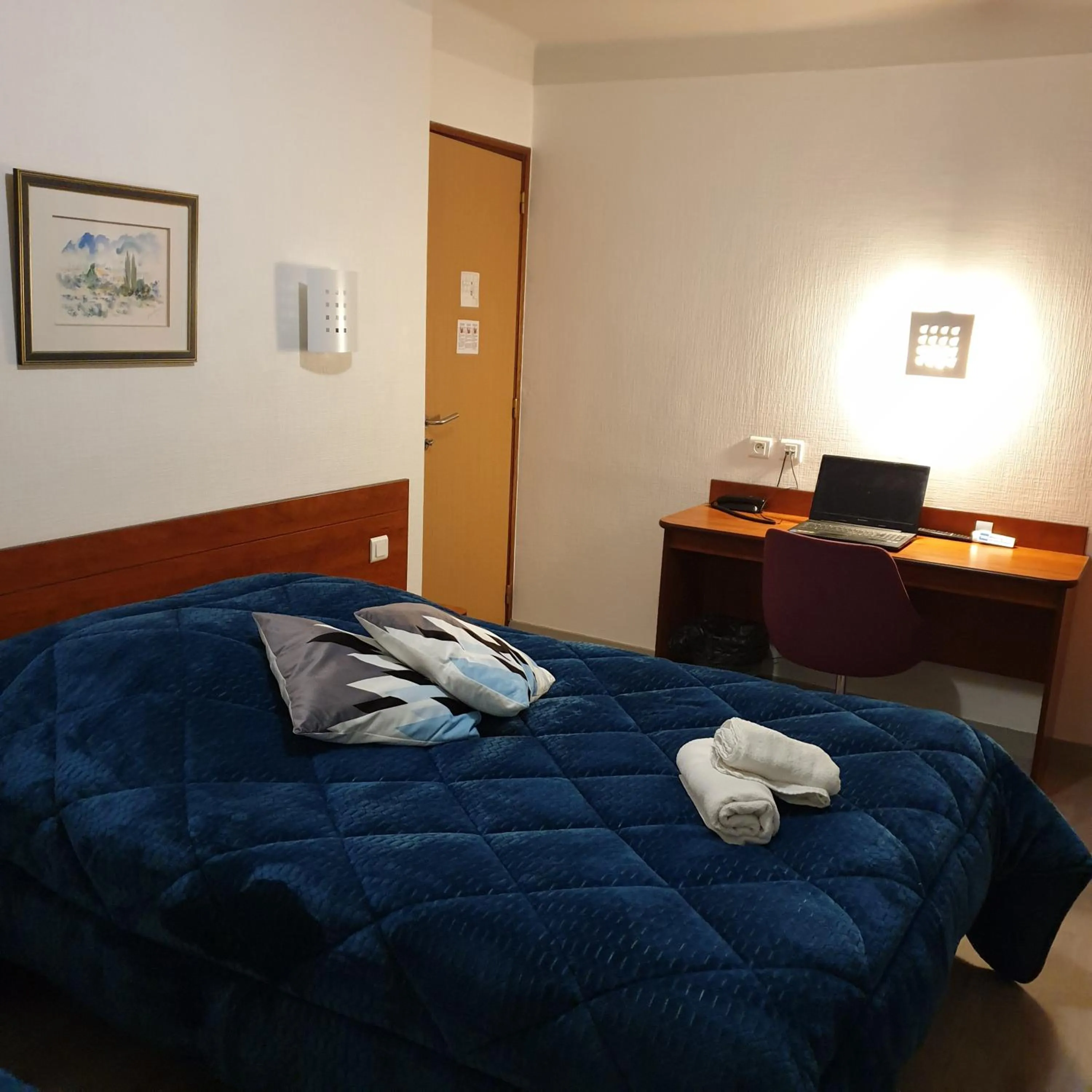 Bedroom in Hotel Restaurant Les Oceanides