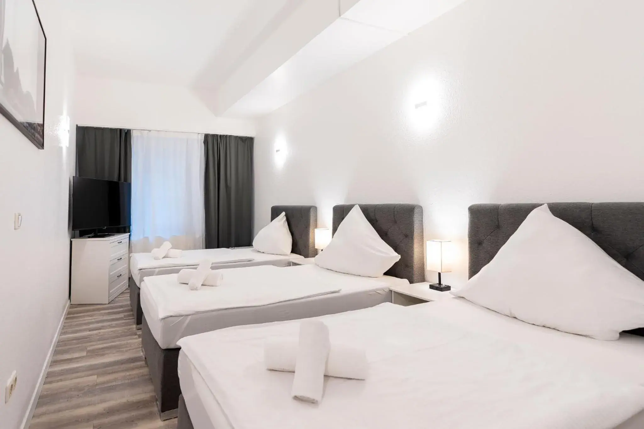 Triple Room with Private Bathroom in Hotel Bergheim Triple Room with Private Bathroom in Hotel Bergheim