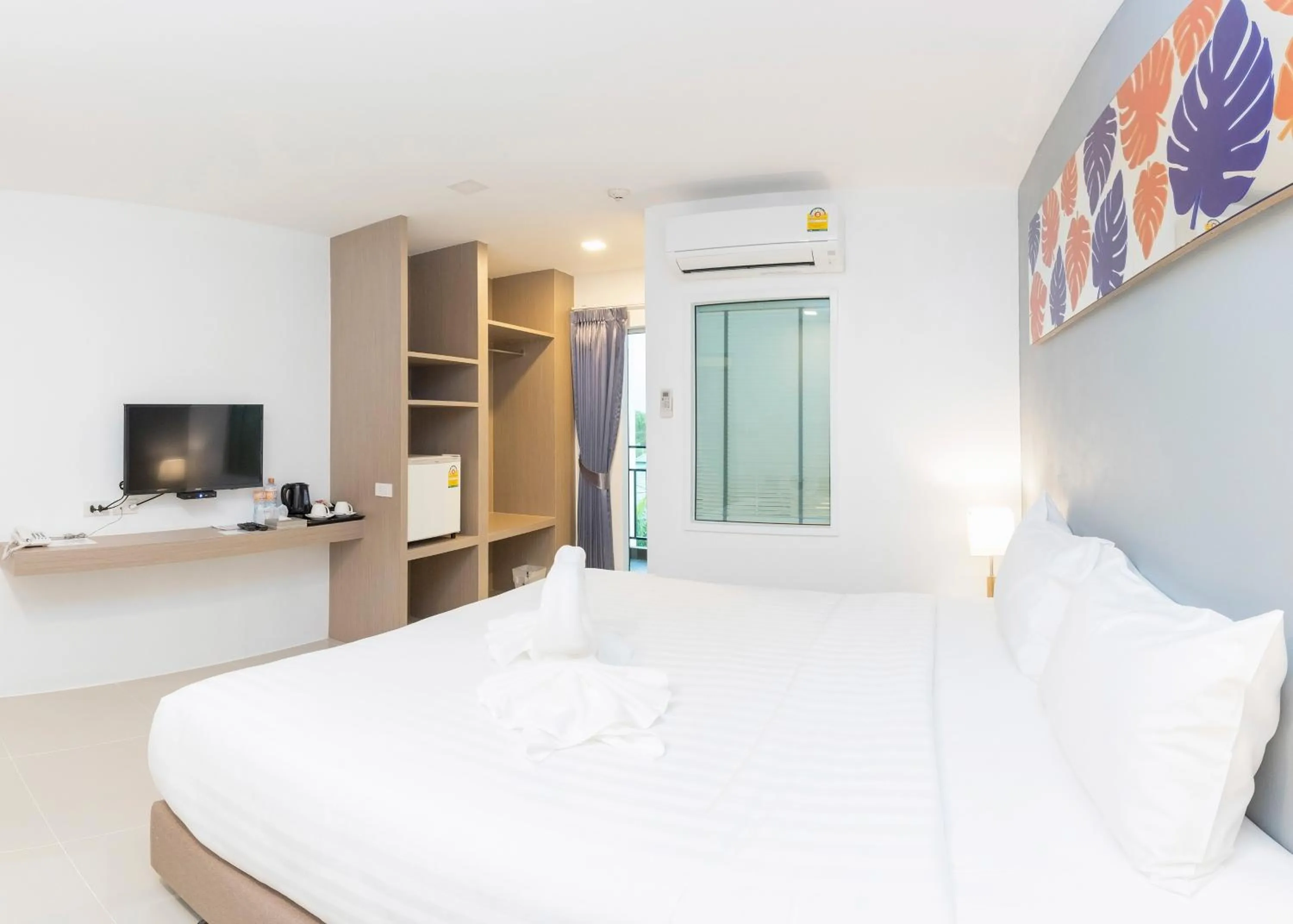 Bed in Trat City Hotel