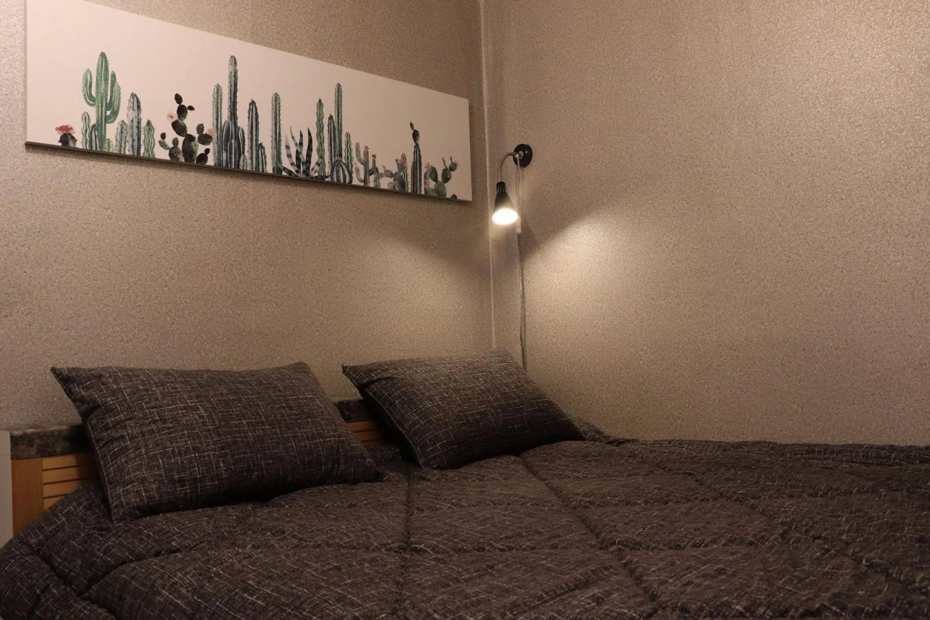 Bed in Jun Guesthouse