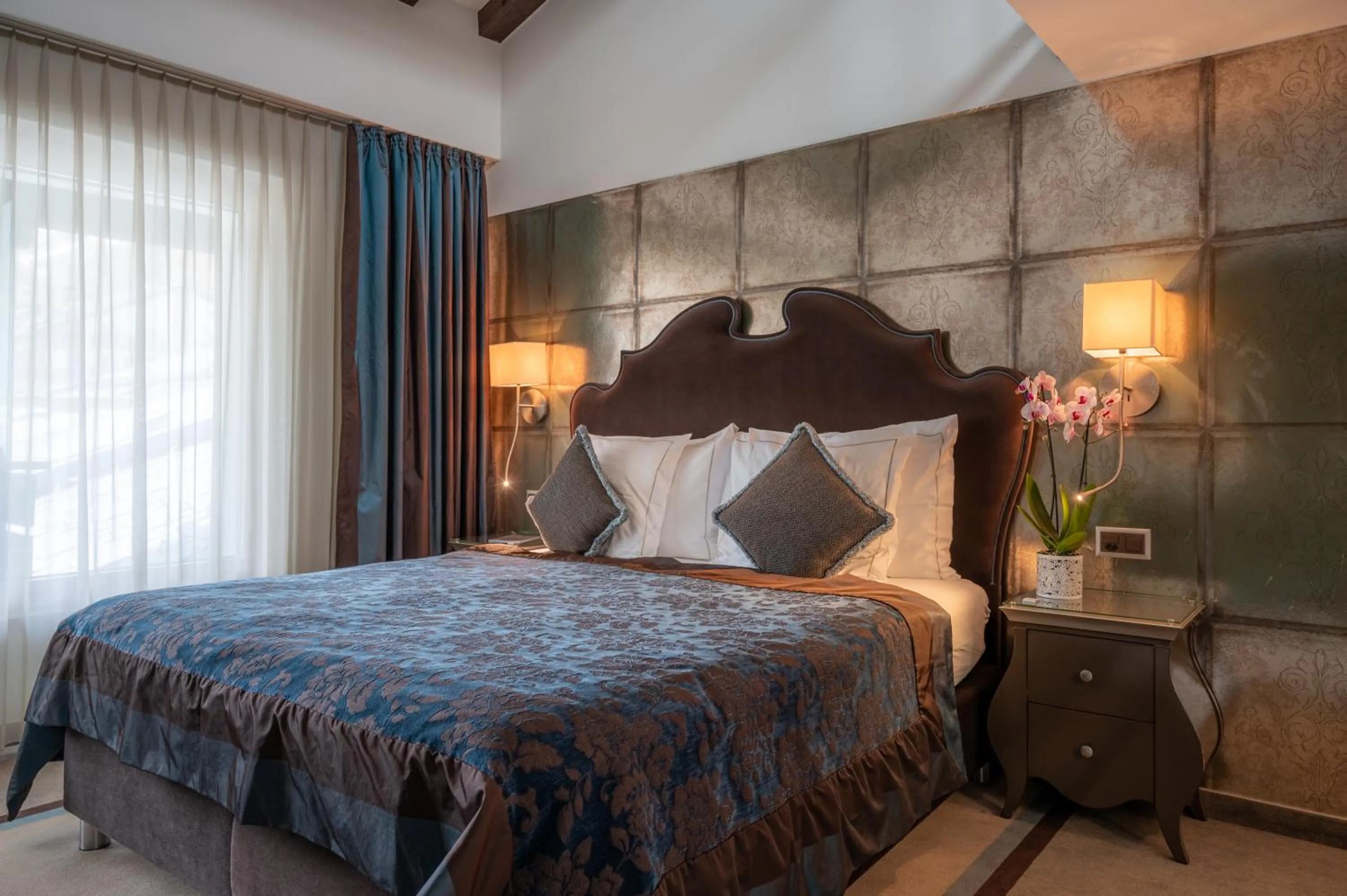 Bed in SchlossHotel Zermatt Active & CBD Spa Hotel